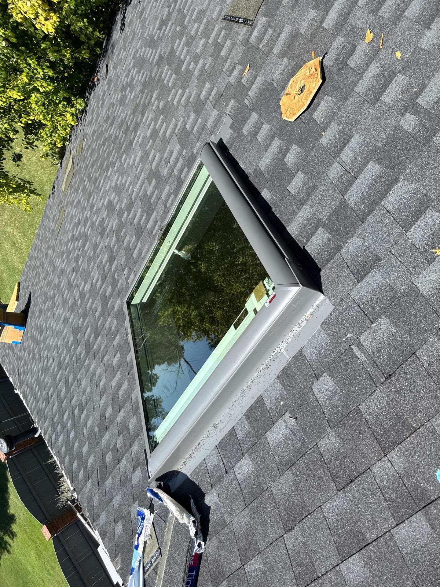 roof, skylight, and full vent system replacement in Mustang by McCann's Roofing and Construction