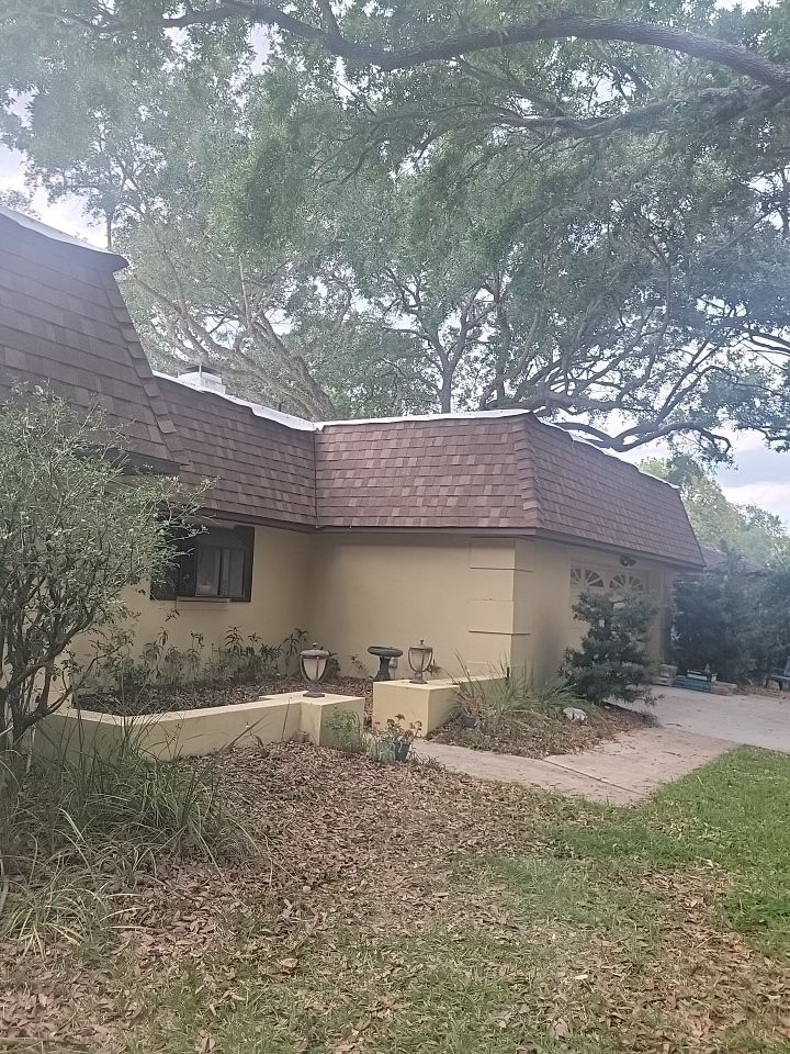 Winter Park Residential Re-Roof and Flat Roof Membrane Installation by Tip Top Roofing Co., Inc.