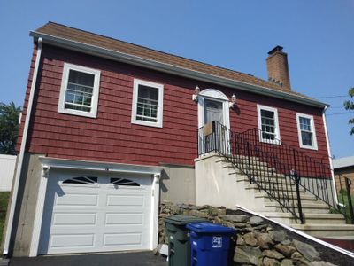 Siding Installation using Royal Building Products Rustic Red