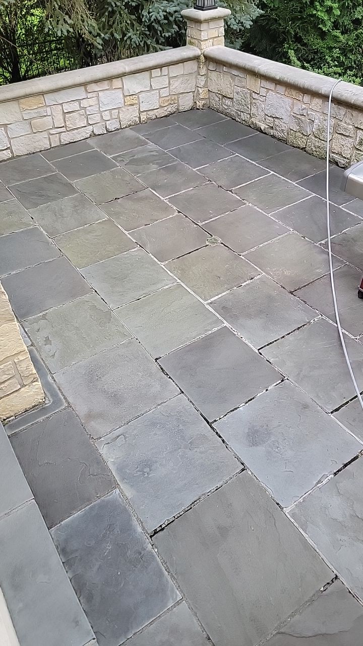 Northbrook, IL stucco home soft wash and stone cleaning by Northern Power Washing LLC.