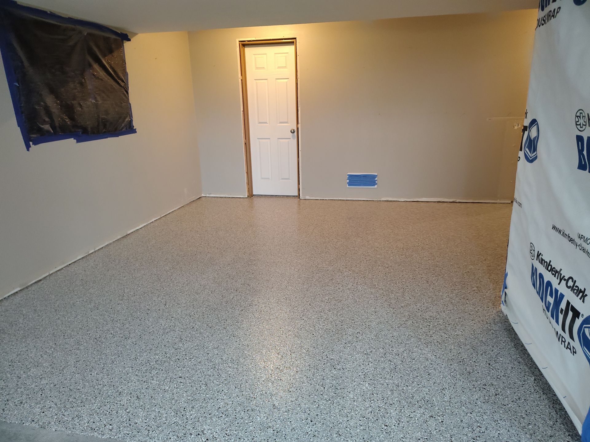 Maxwell, IA Coyote Flake Garage and Basement by Revival Concrete Coatings