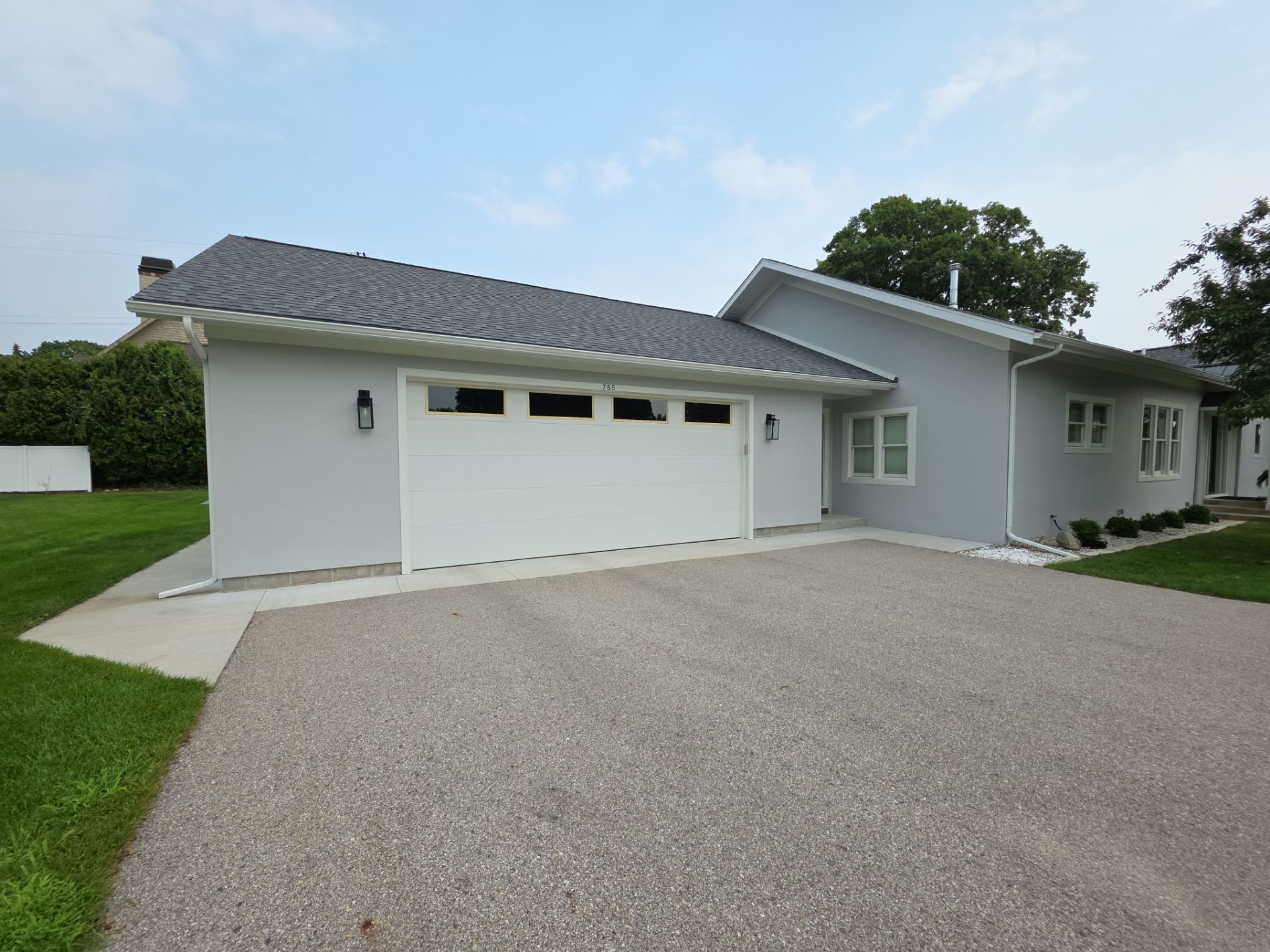 Norton Shores Residential Stucco Repair and Exterior Painting Refresh by Gordon Painting