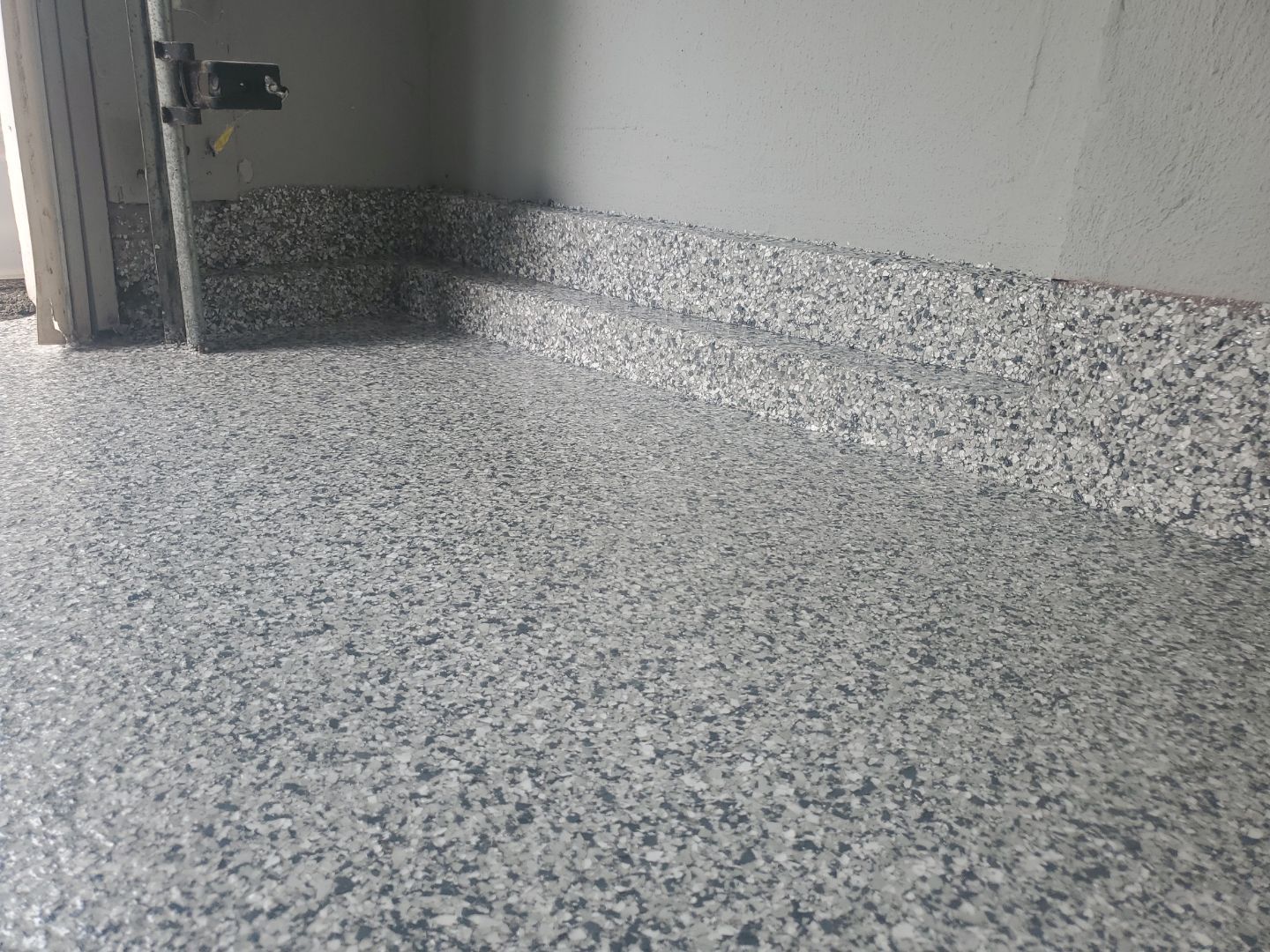 Garage in Chicopee, MA 01013 by Symphony Concrete Coatings