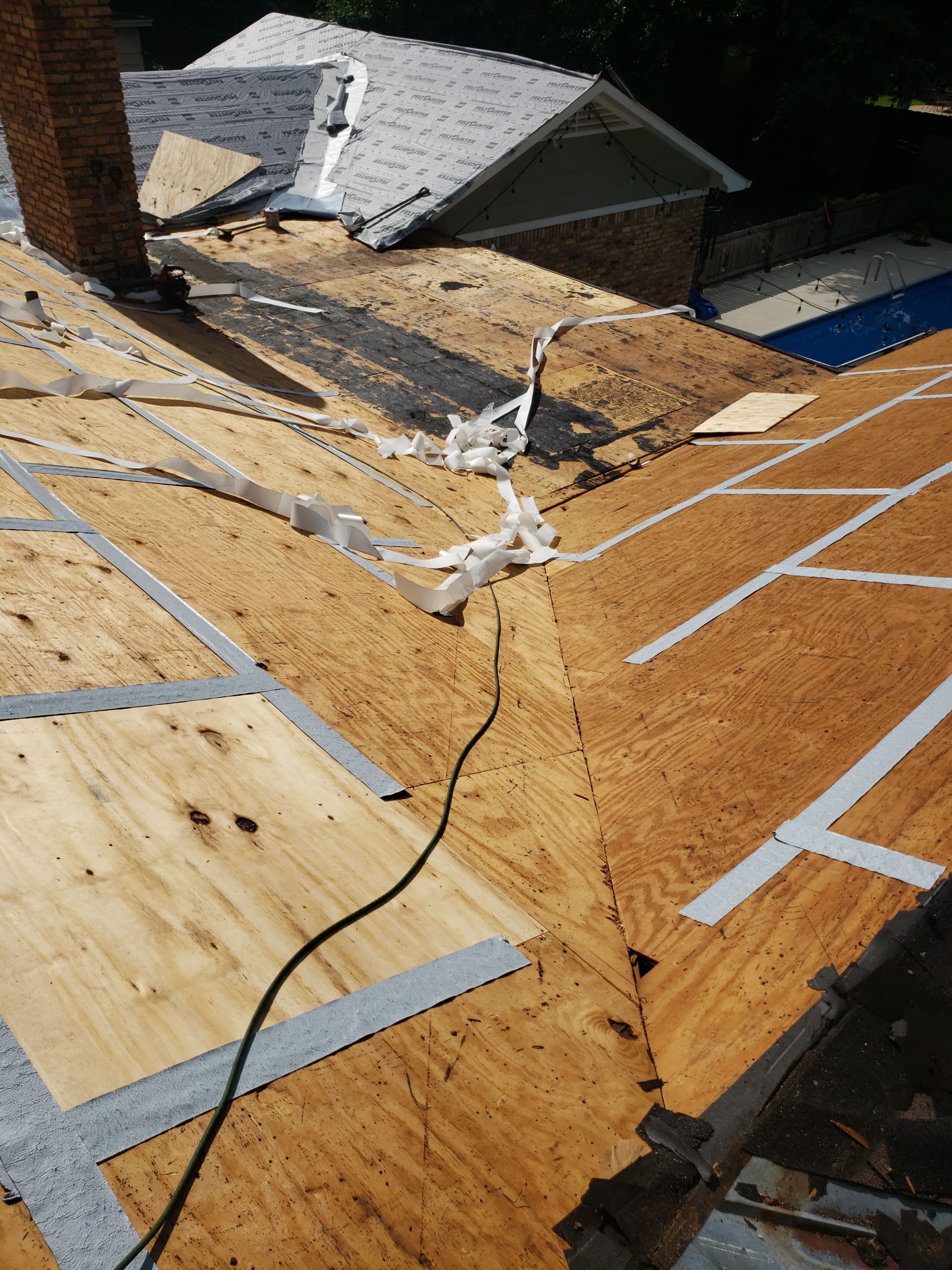 Residential Roofing Installation using Roof Replacement by American Roofing & Construction LLC