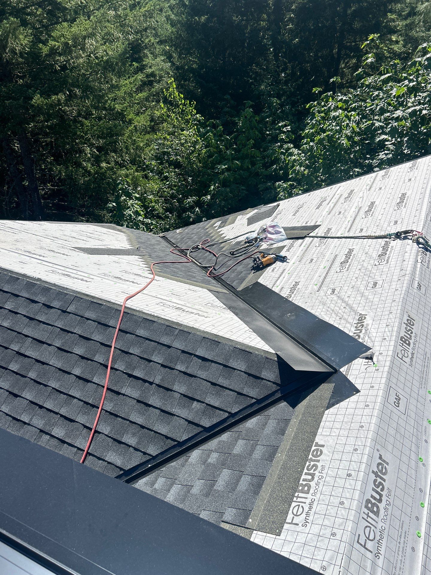 Residential Roofing Installation using GAF timberline HDZ Charcoal by Top Notch Roofing Inc