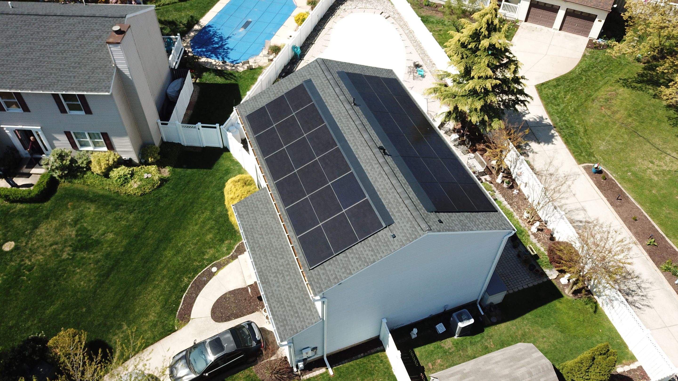 Roof Replacement with GAF Decotech integrated solar panels by American Home Contractors