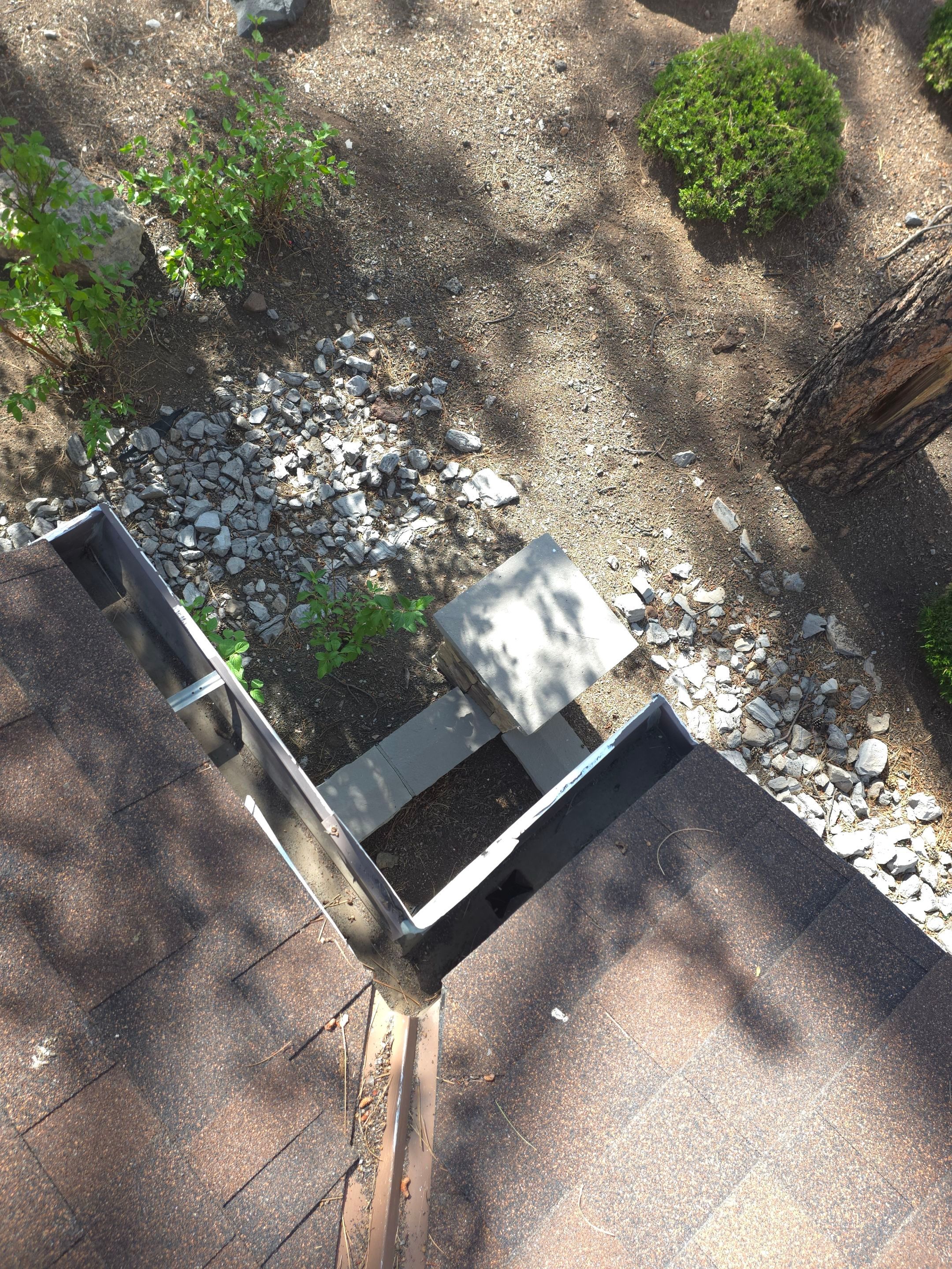 HOA gutter cleaning in Flagstaff, AZ after photo showing full gutters.