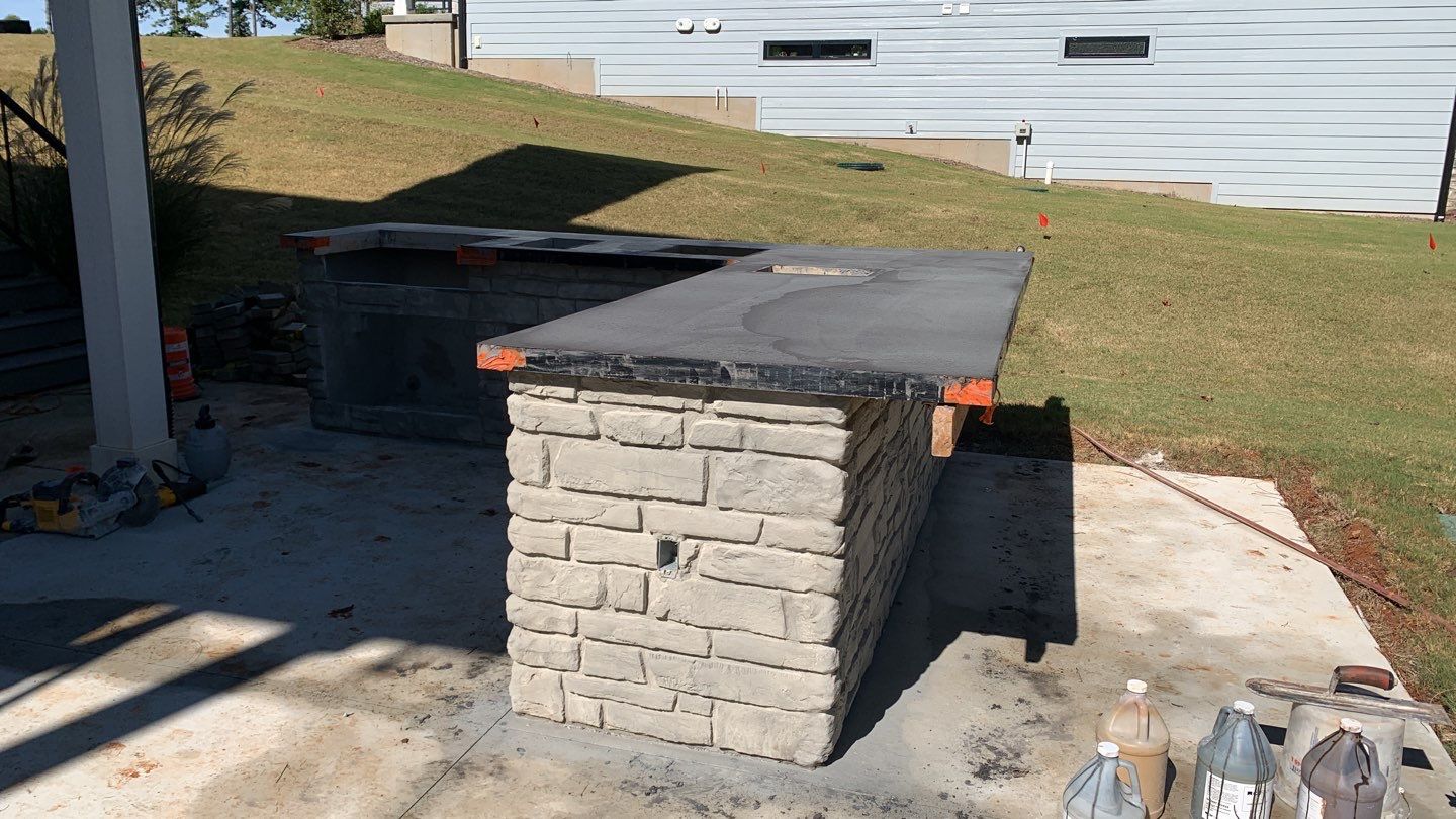 Outdoor Kitchen on Lake Keowee by Xtreme Concrete Services