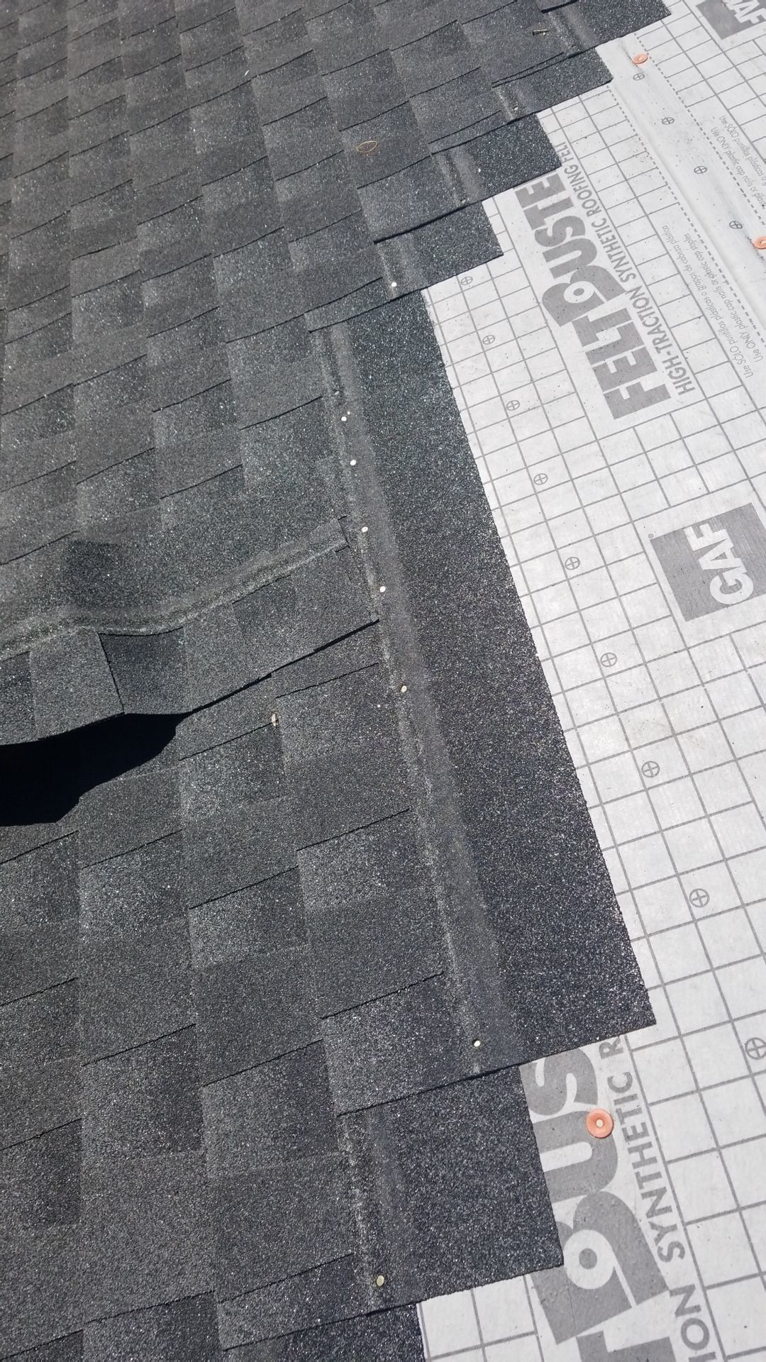 Residential Roofing Installation using Roof Replacement by American Roofing & Construction LLC