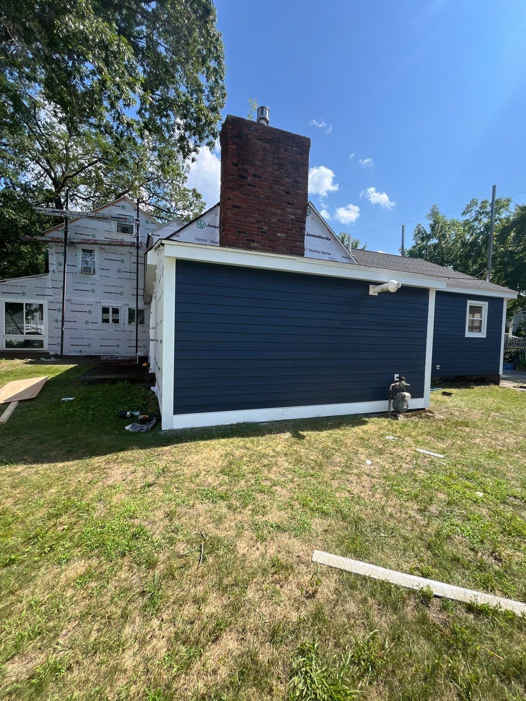 James Hardie Lap Siding Installation in Chelmsford, MA by Mighty Dog Roofing of Greater Middlesex County
