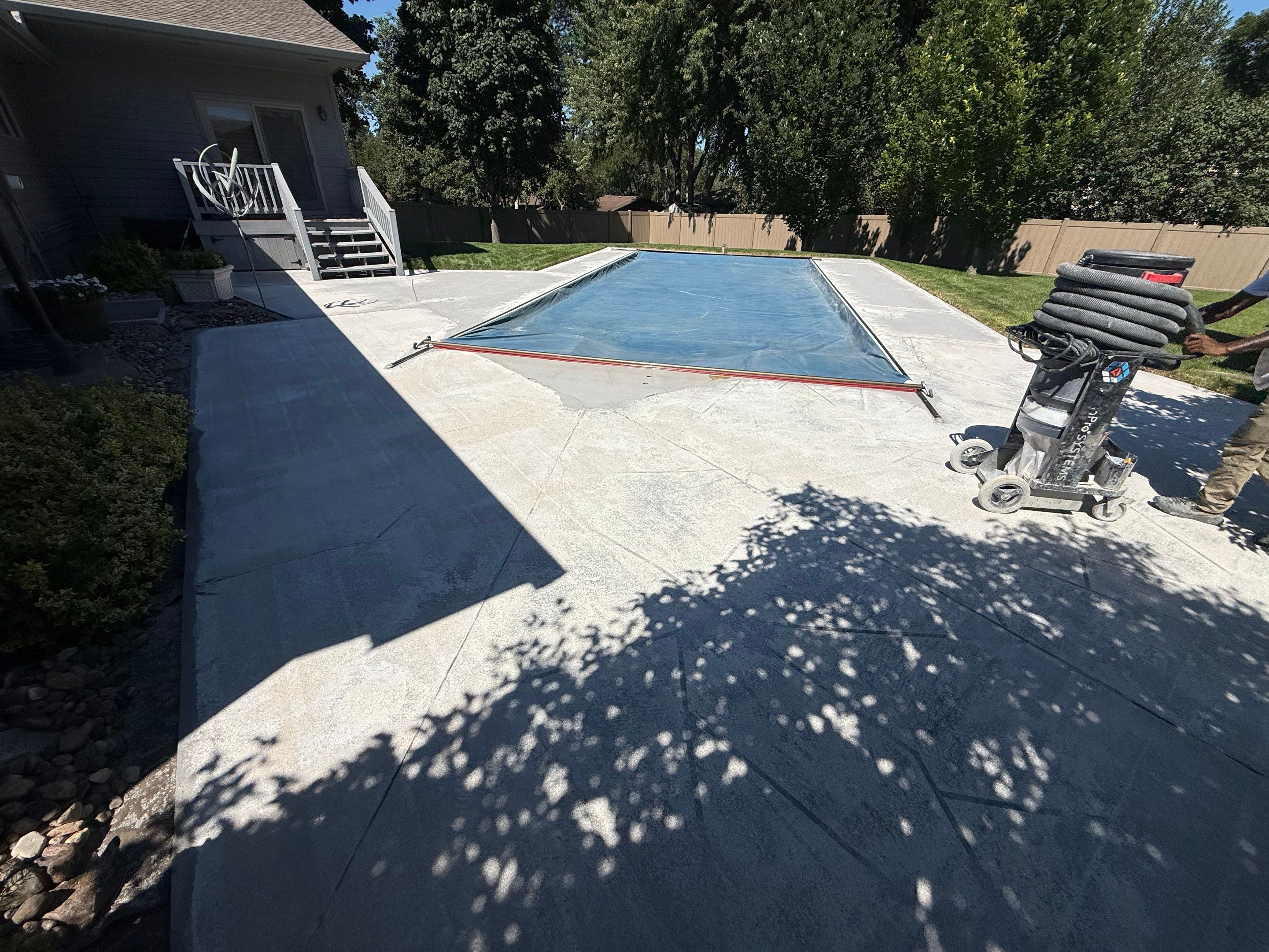 Residential Pool Deck Resurfacing in Sioux Falls by Select Painting, Coatings & Garage Cabinets