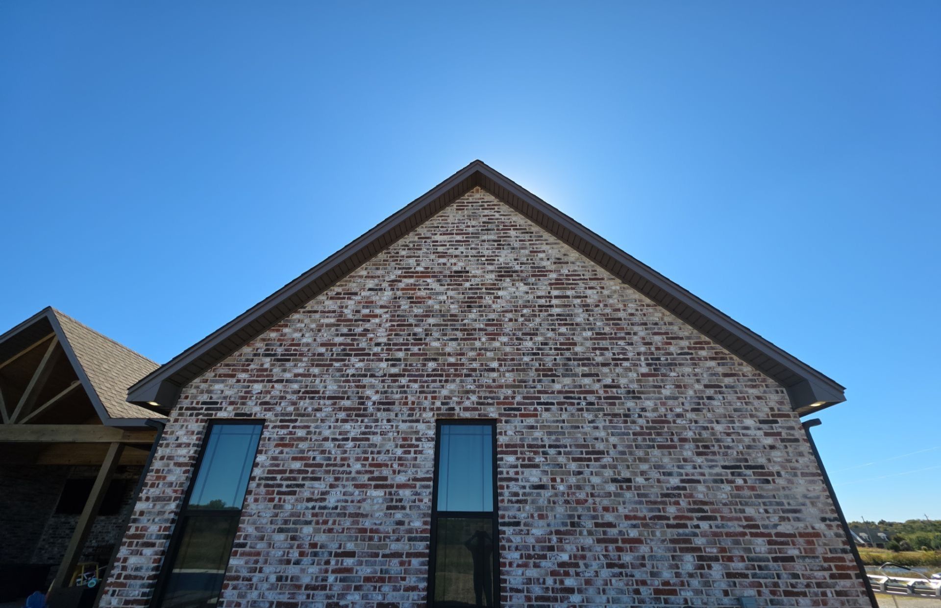 Fascia and door frames wrapped with PVC coil & soffit installation by In & Out Construction & Remodeling, LLC