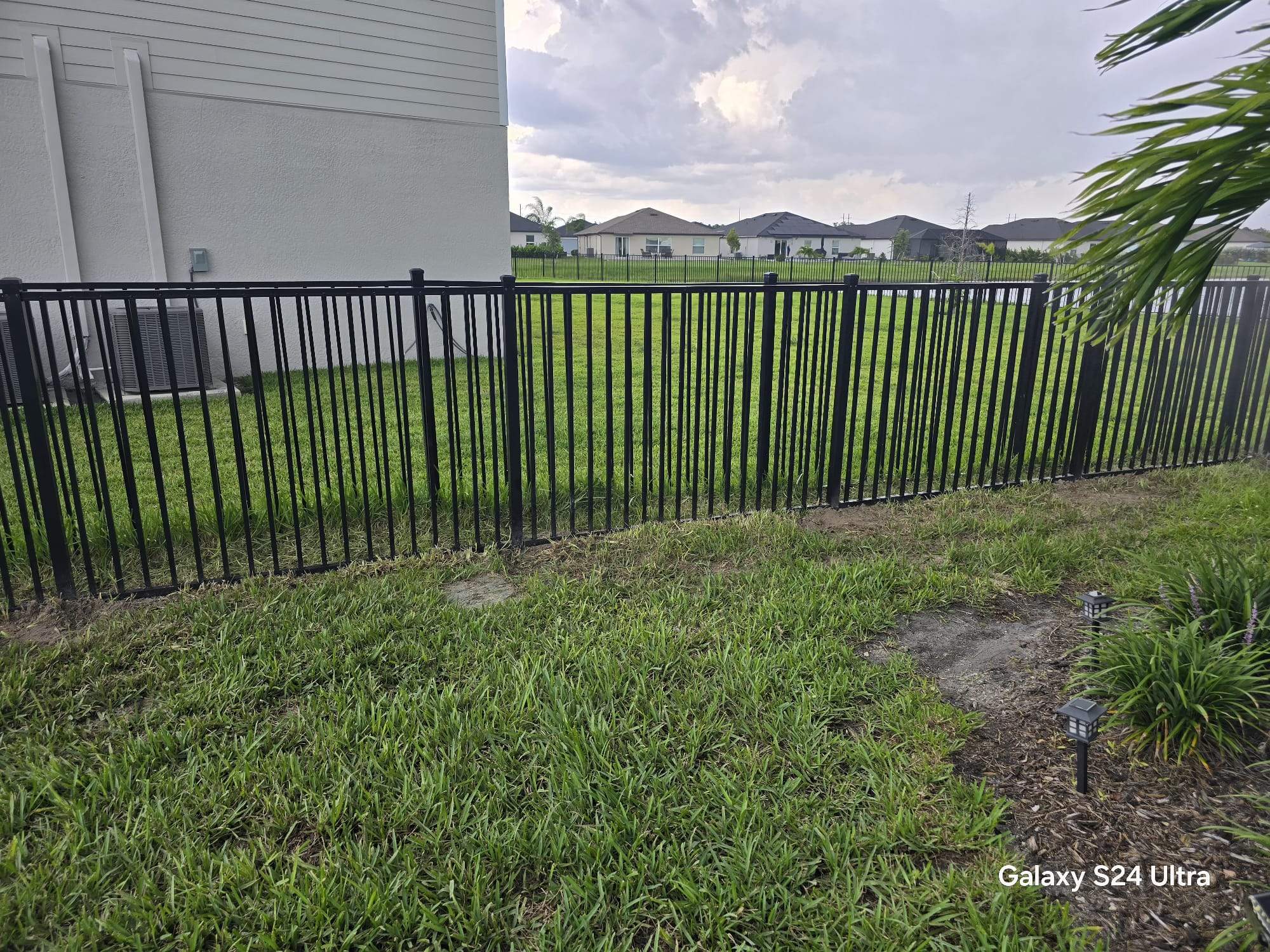 Black Aluminum Picket Fence Installation in North Fort Myers by True Fence LLC