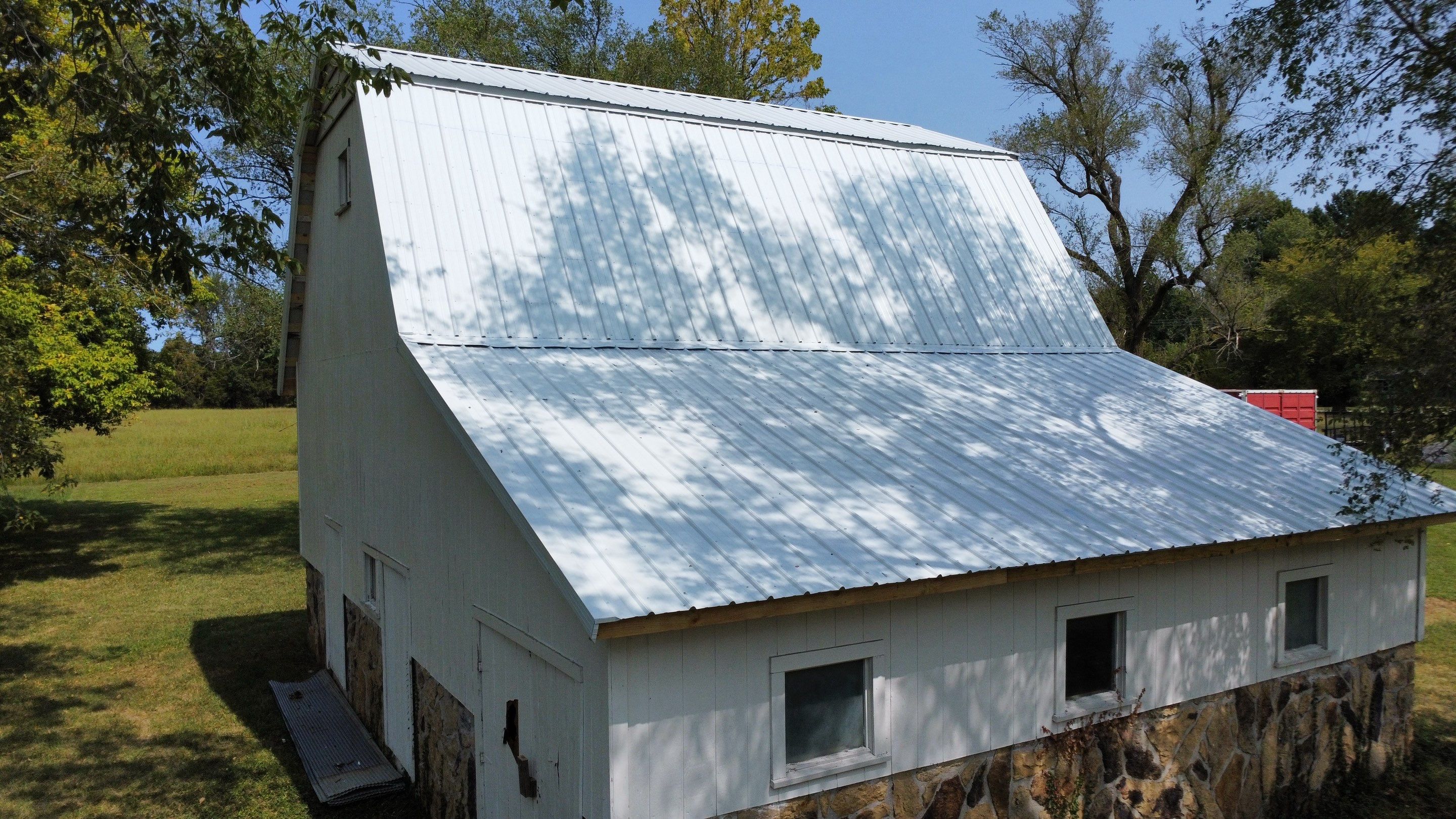 Residential Barn Roofing Install - 26 Gauge G-Rib Metal - Color bright White by Titan Commercial & Residential Roofing