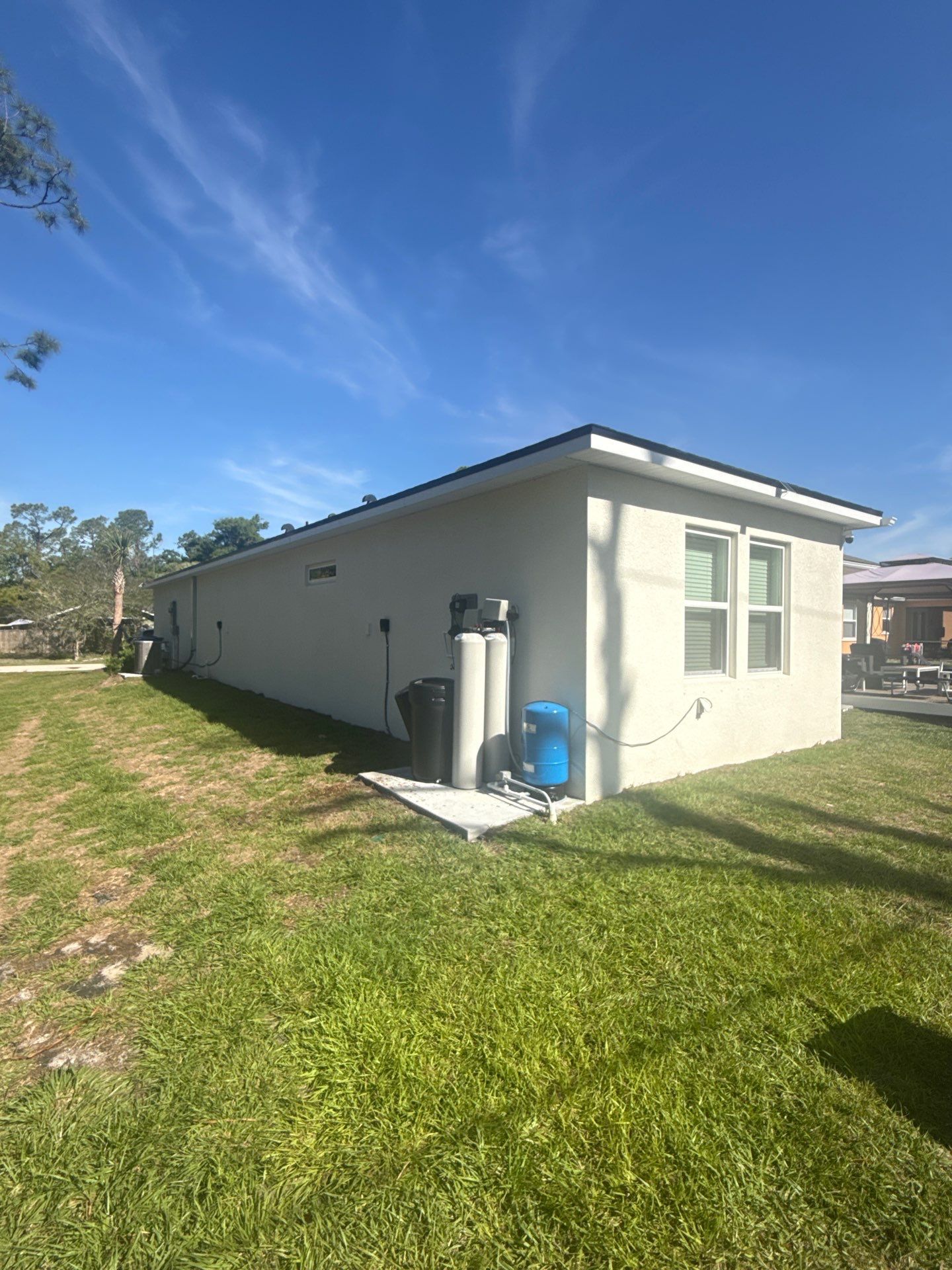 6-inch K-style White Seamless Gutters with Downspouts in North Port, FL by Gutter Professors