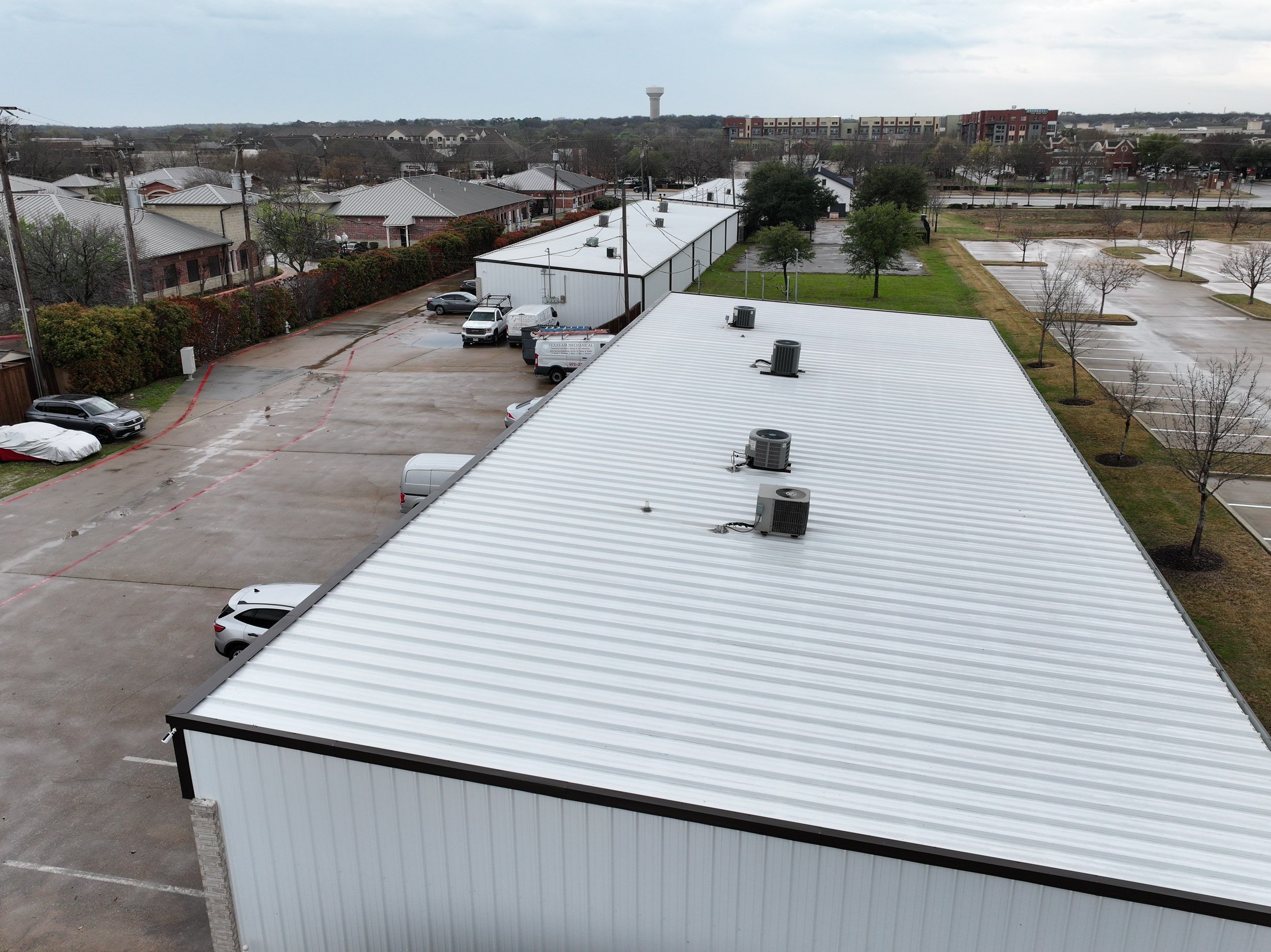 Commercial Roofing Installation using Double lock Mechanical Standing Seam Metal by Becker Roofing and Exteriors