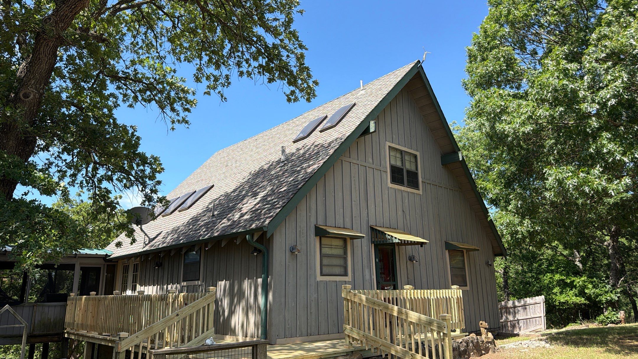 Architectural Shingle Roof Replacement and Skylight Installation in Sulphur by BANA Roofing and Solar Supply