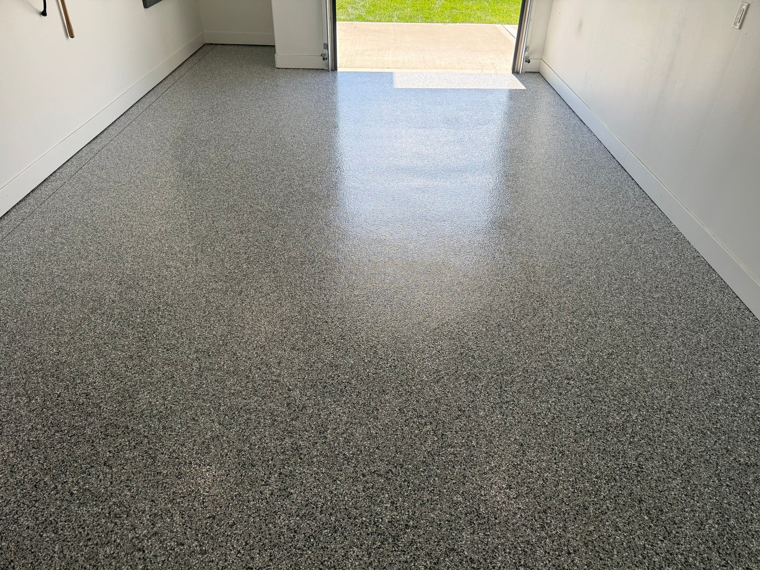 Gravel Flake Garage Floor Coating in Yankton by Select Painting, Coatings & Garage Cabinets