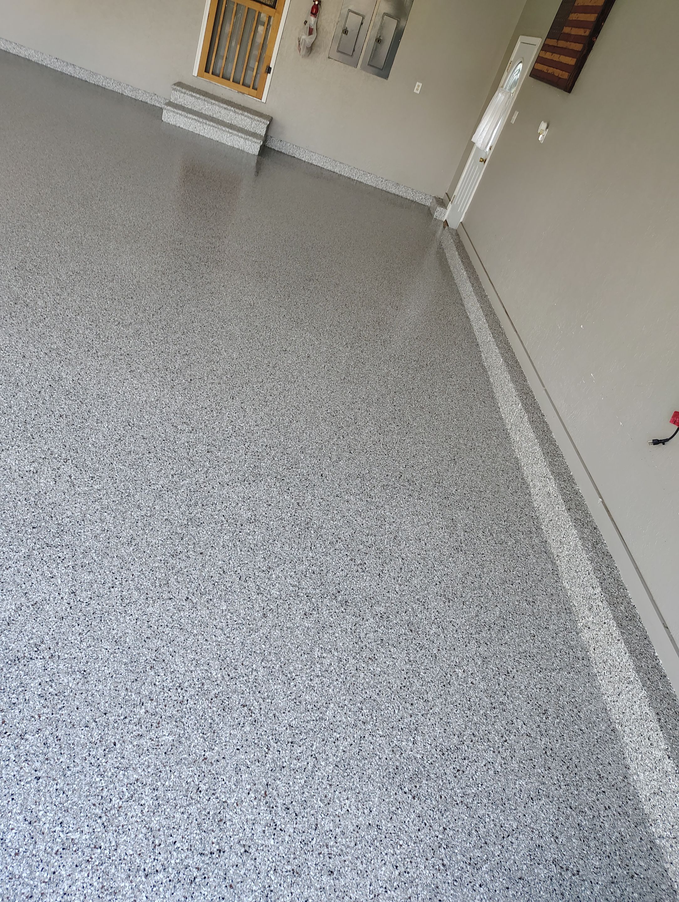 Garage Concrete Floor Coating and Crack Repair in Onawa by Select Painting, Coatings & Garage Cabinets