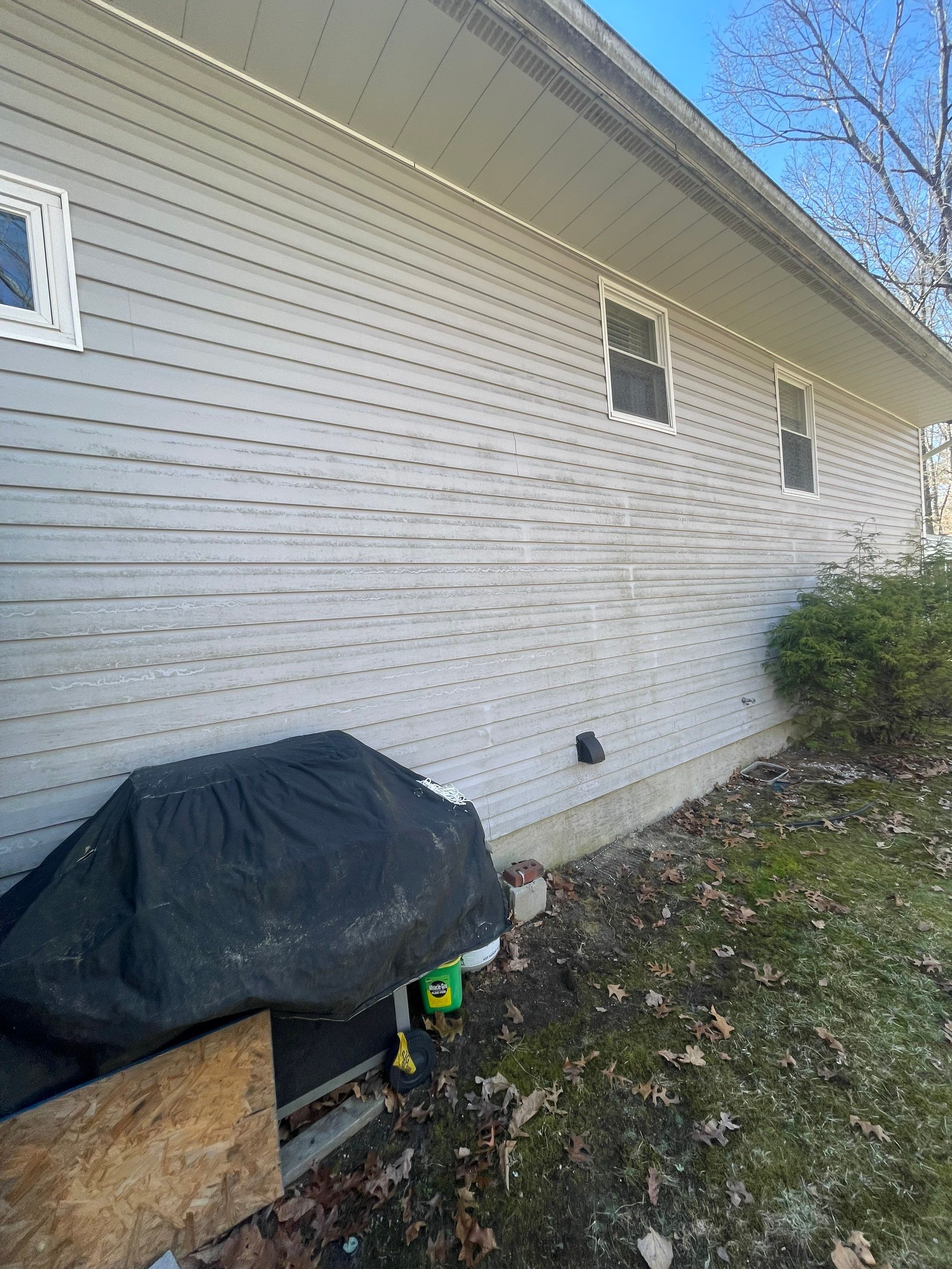 Pressure treated wood deck cleaned by SJ Exterior