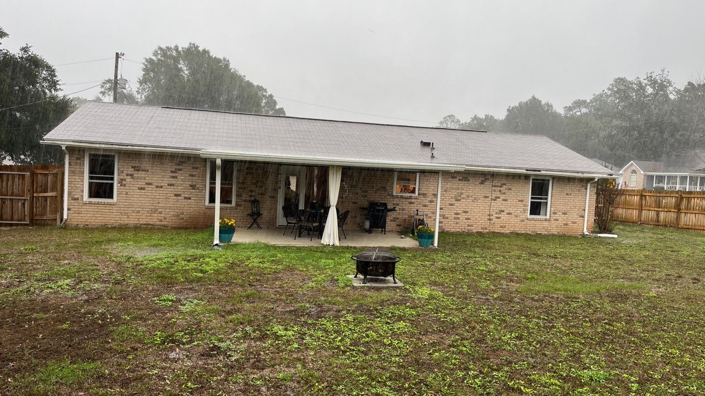 White Seamless Gutter Installation in Milton FL by Gutter Professors