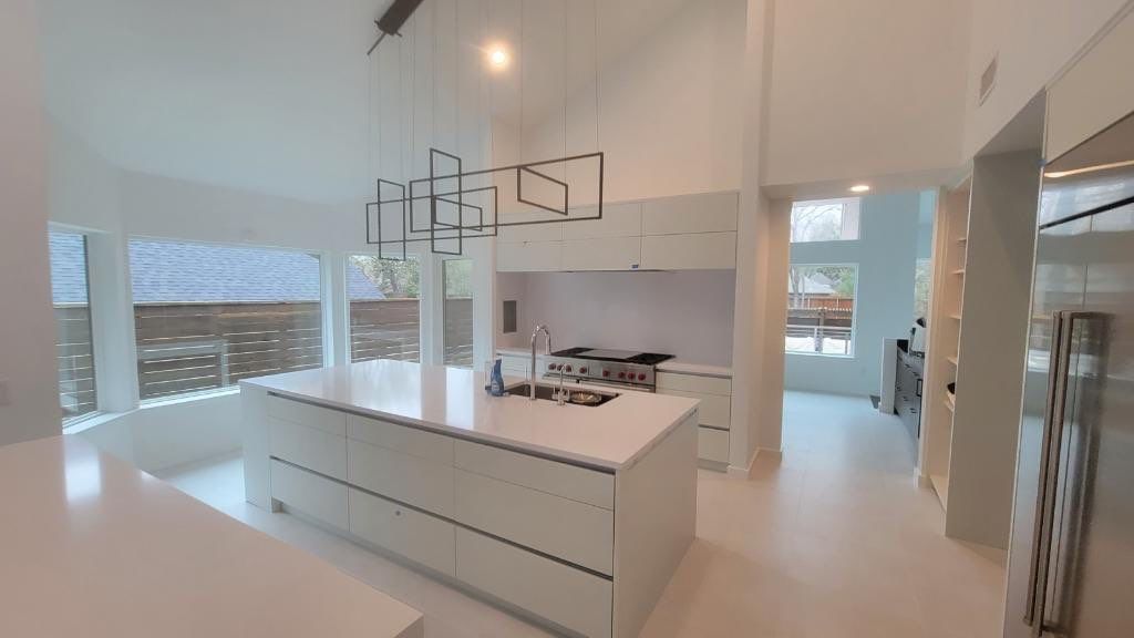 Modern & Clean Kitchen by SLM General Contractors & Roofing