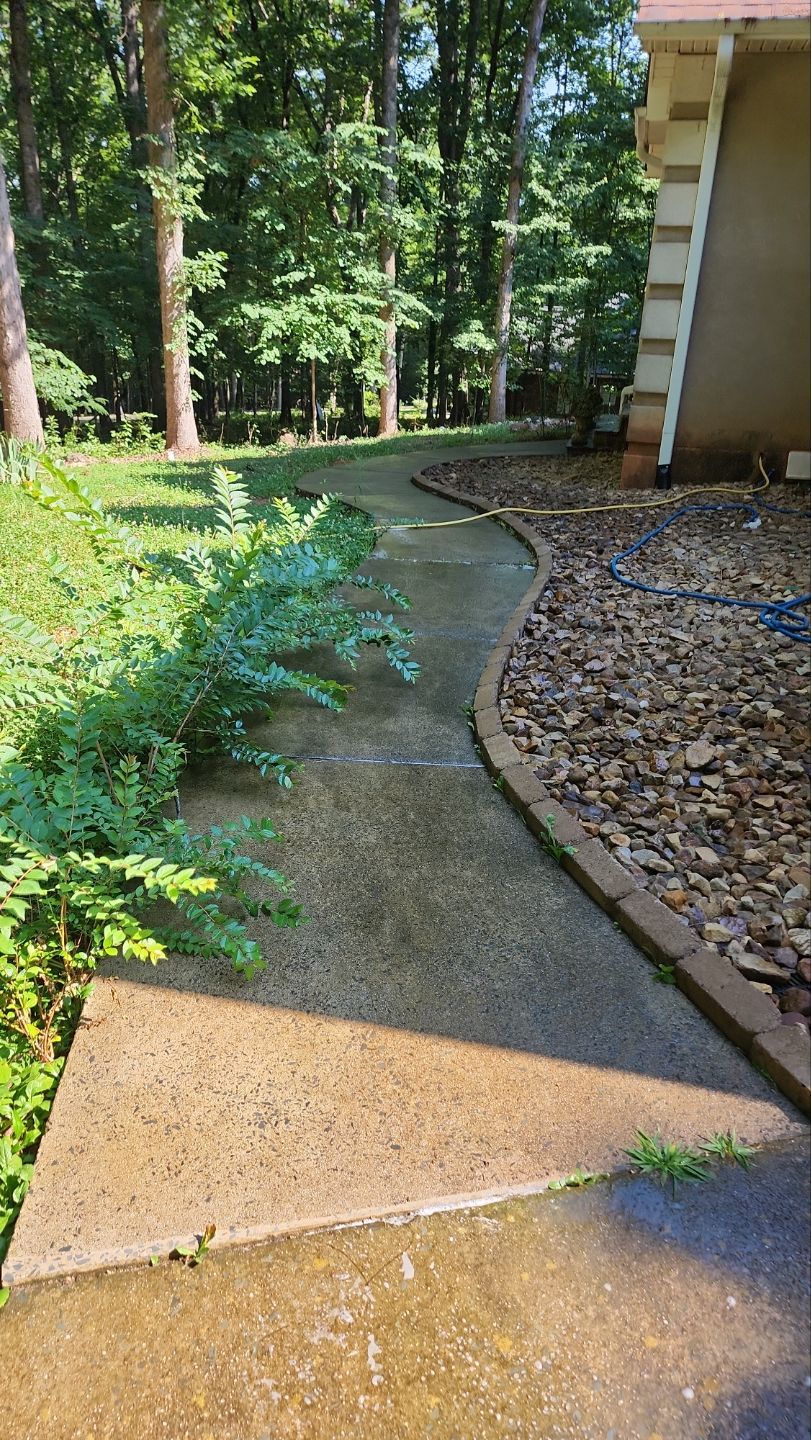 Driveway Clean using cleaner by Power Wash Masters LLC