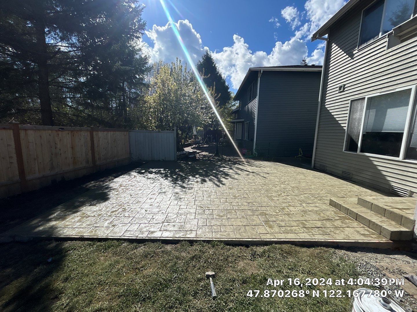 Benedict | Stamped Concrete Back Patio by Jireh Asphalt & Concrete Inc 