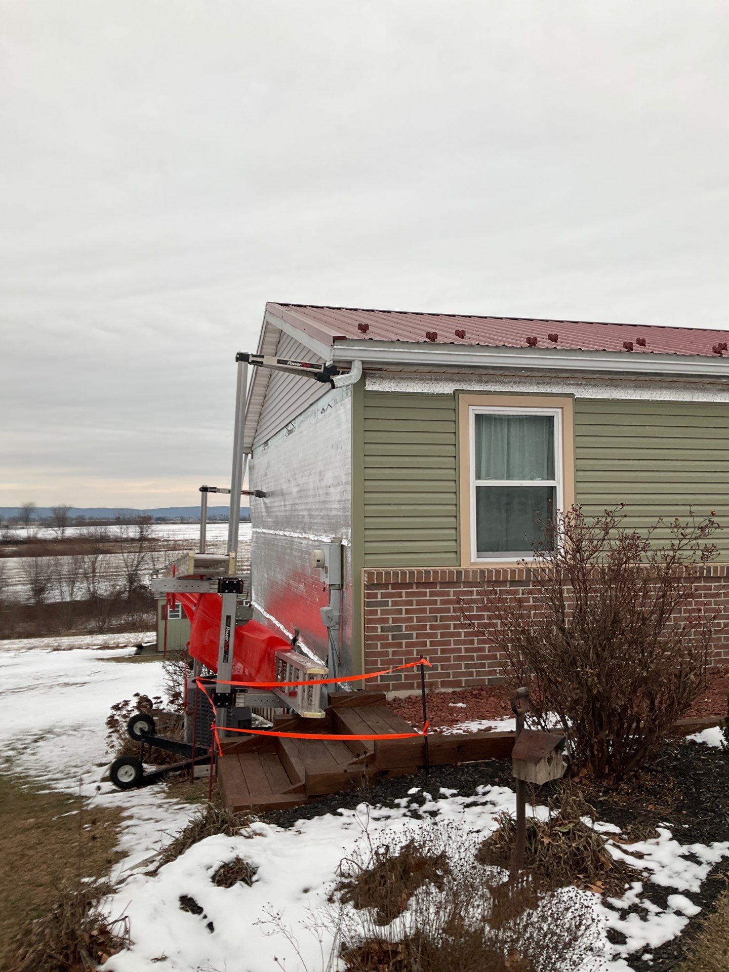Vinyl Siding Replacement and Patio Door Installation in Elizabethville by Esh Builders