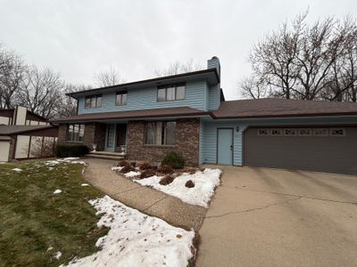 Full Exterior Home Painting and Siding Refurbishment in Sioux Falls