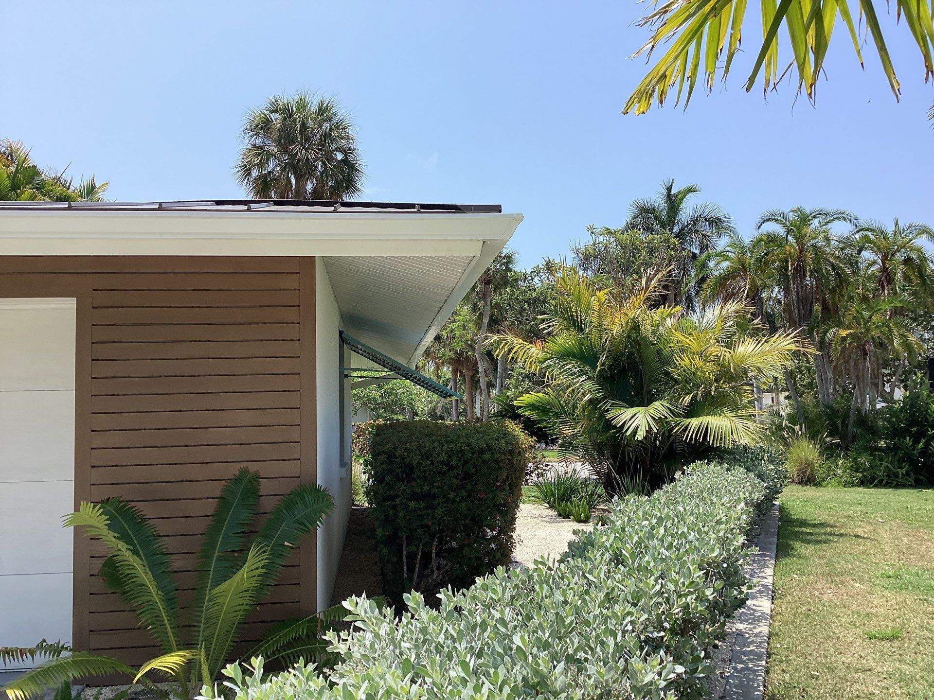 White Seamless Gutters and Downspouts in Sarasota FL by Gutter Professors