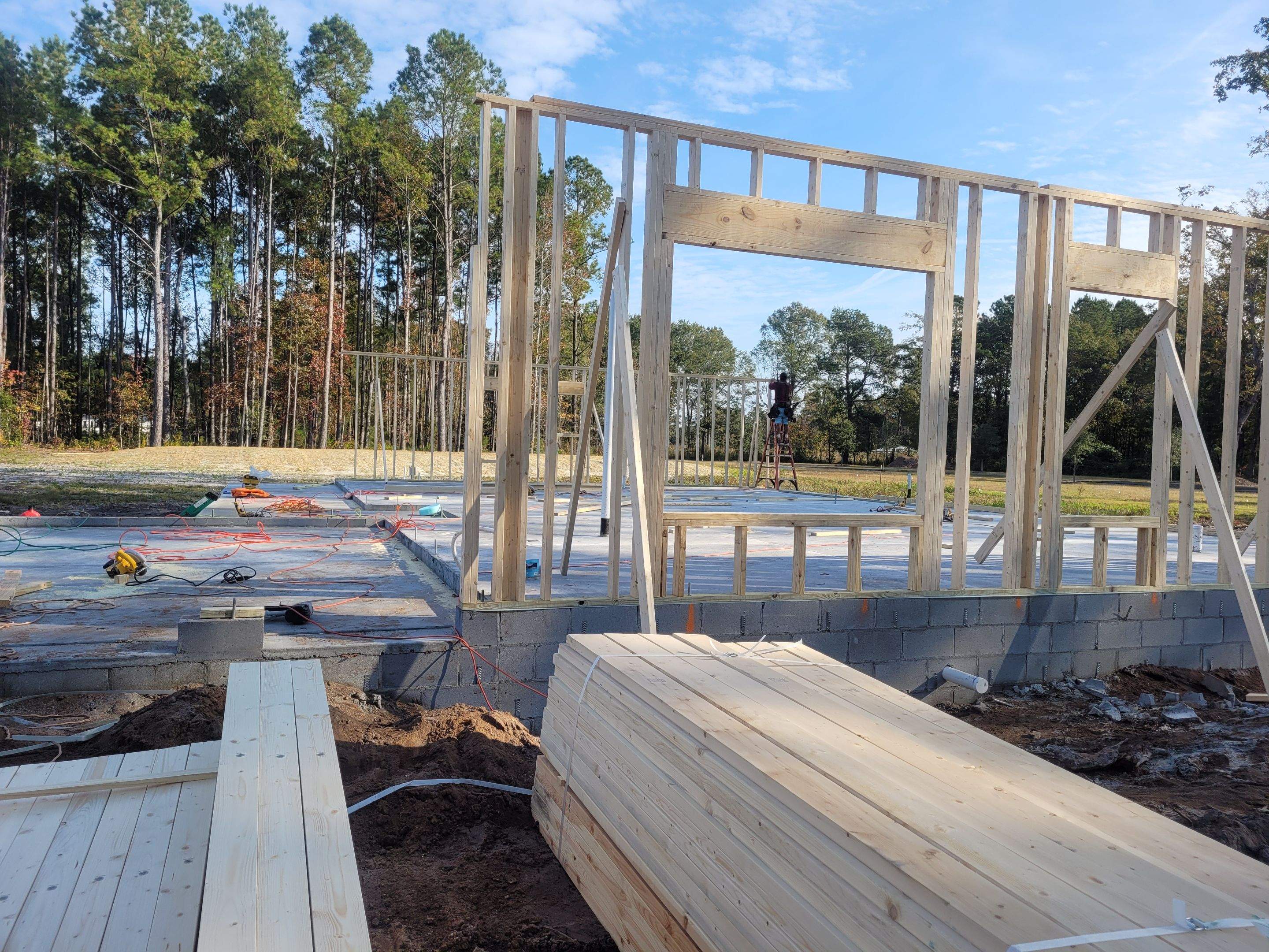 New Home Construction using brick and vertical vinyl by Cornerstone Home Builders, LLC