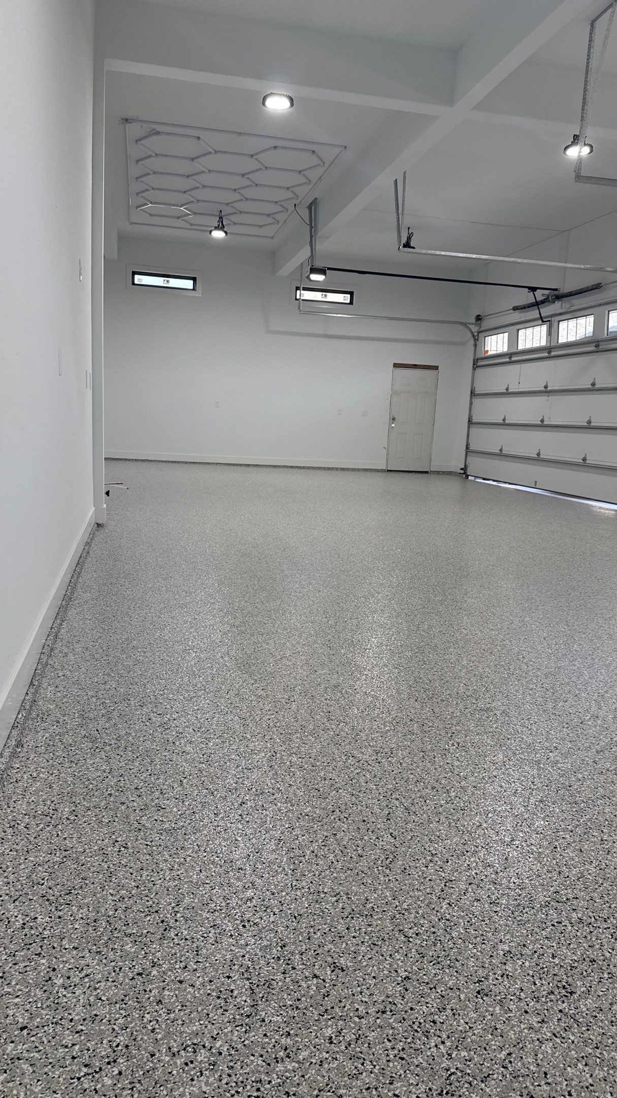 Chris Made The Great Choice Of Cabin Fever Flake Floor by Banner Garage