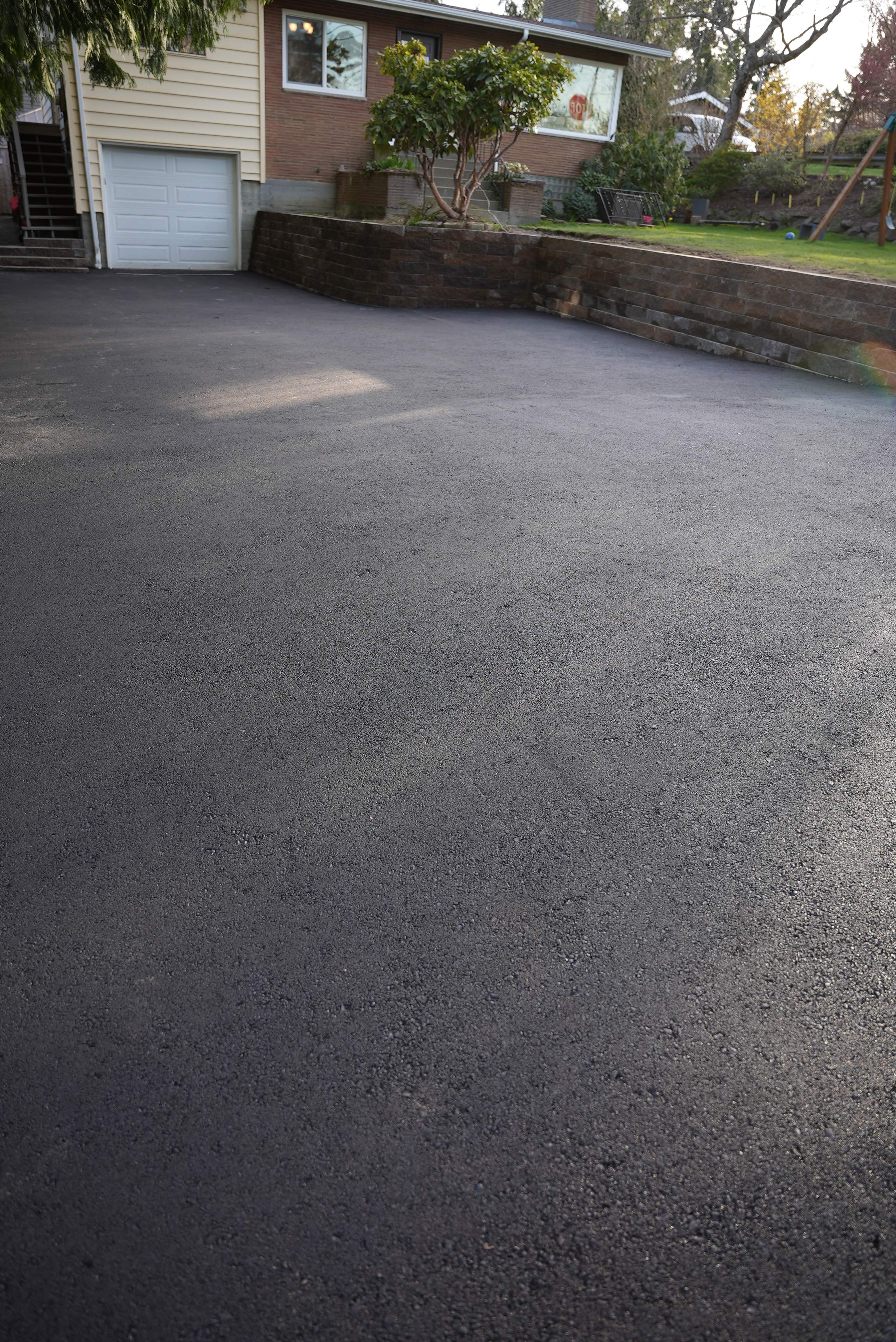 Lorra | Asphalt Driveway Repair & Retaining Wall by Jireh Asphalt & Concrete Inc 
