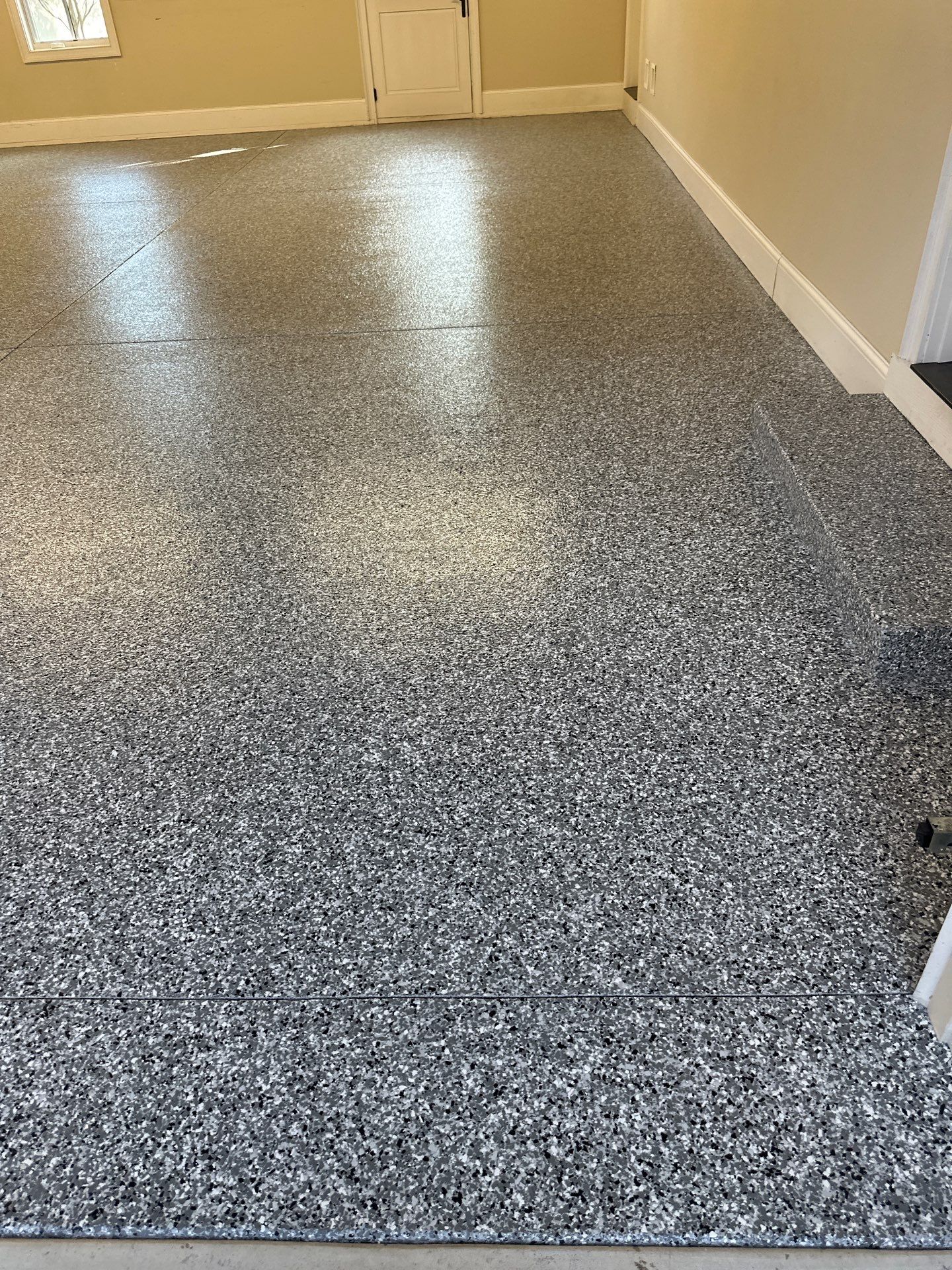 Garage Floor Coating using Wombat by My Garage Floor Guys