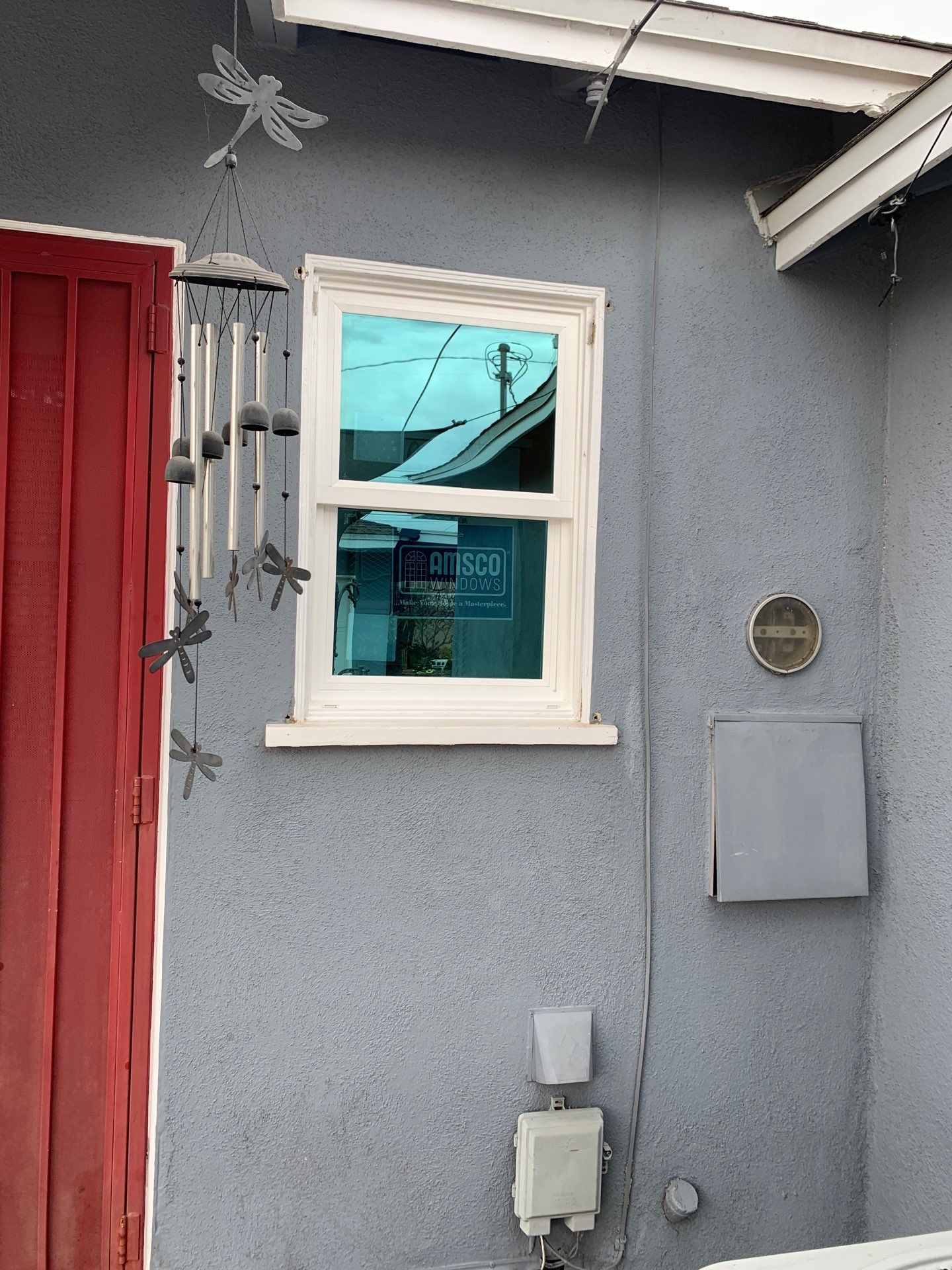 Patio door installation using Amsco Studio Series Vinyl by American Window Company