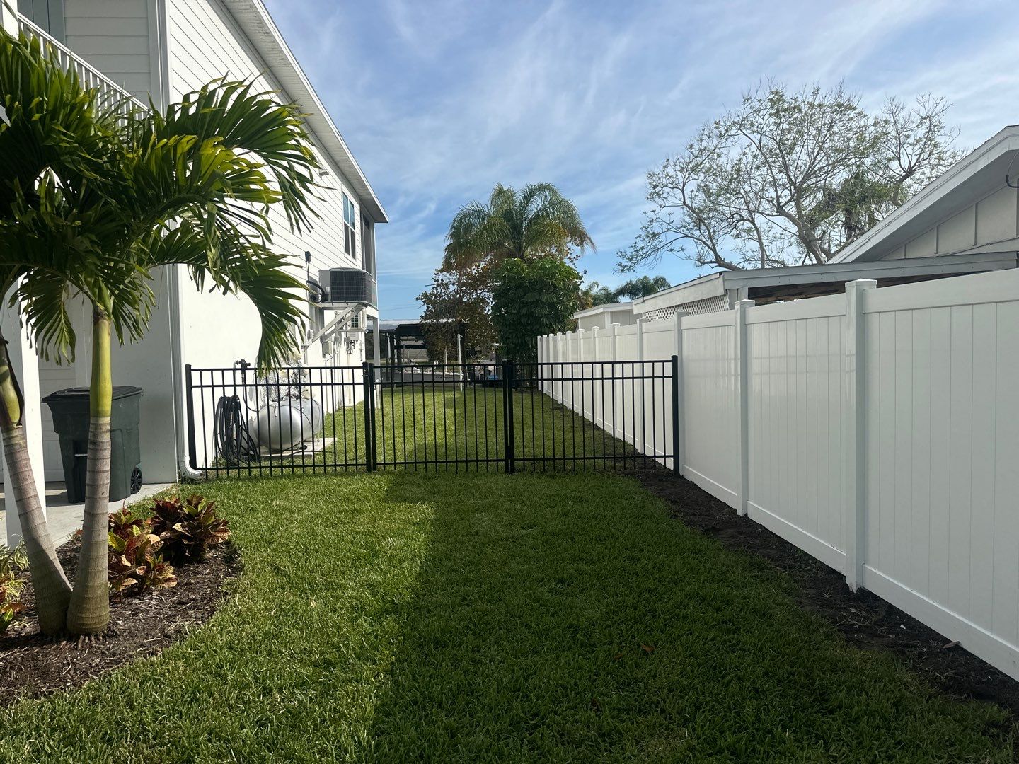 Aluminum Fence Installation using Black 3 Rail Aluminum and Vinyl Privacy Fence  by Asap fence and gates, LLC