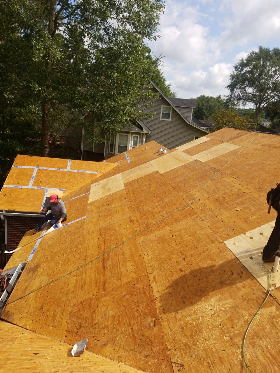 Residential Roofing Installation using Roof Replacement by American Roofing & Construction LLC