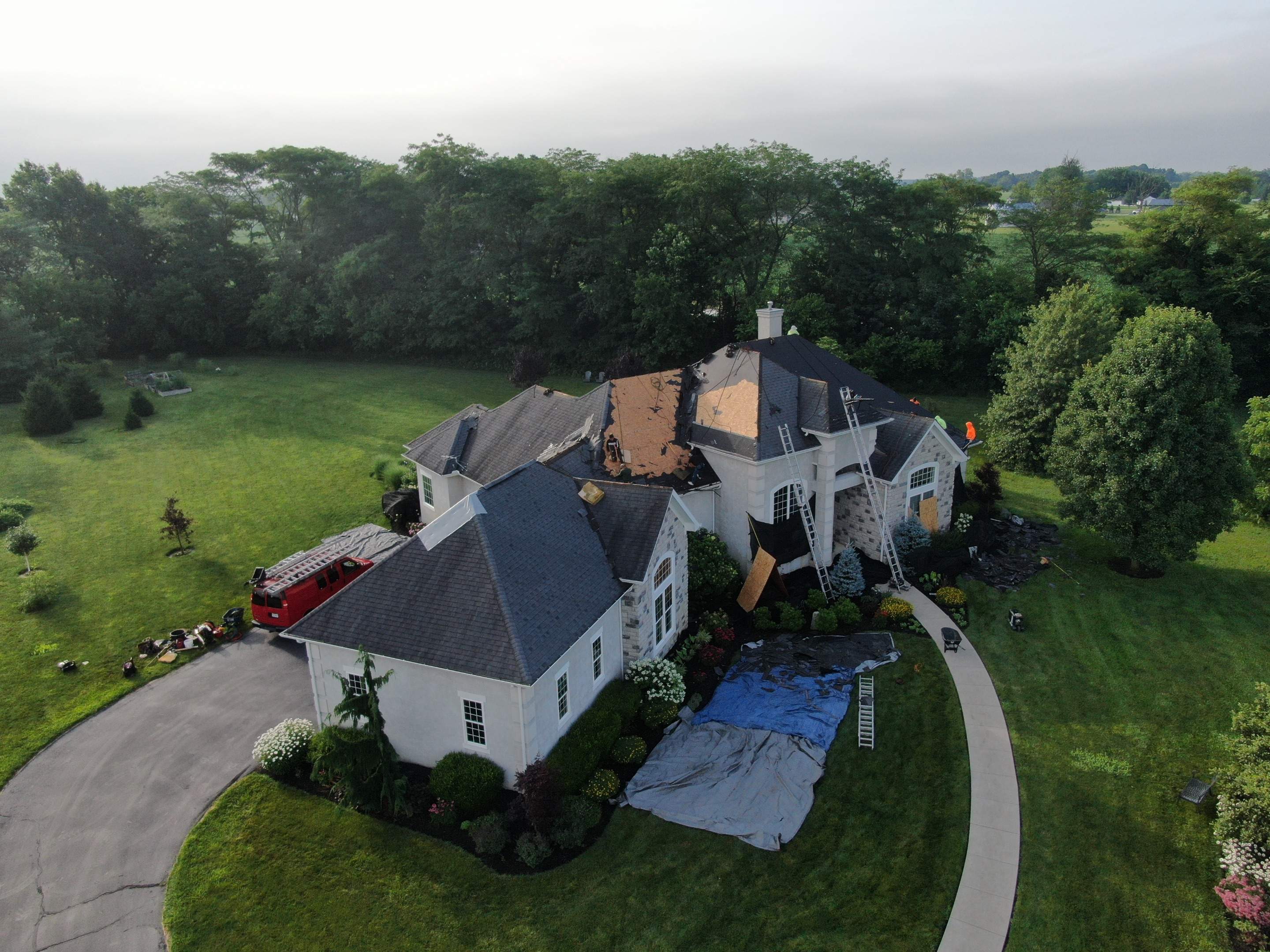 Residential Roofing Installation using Atlas Pinnacle Black Shingles by 614 Exteriors