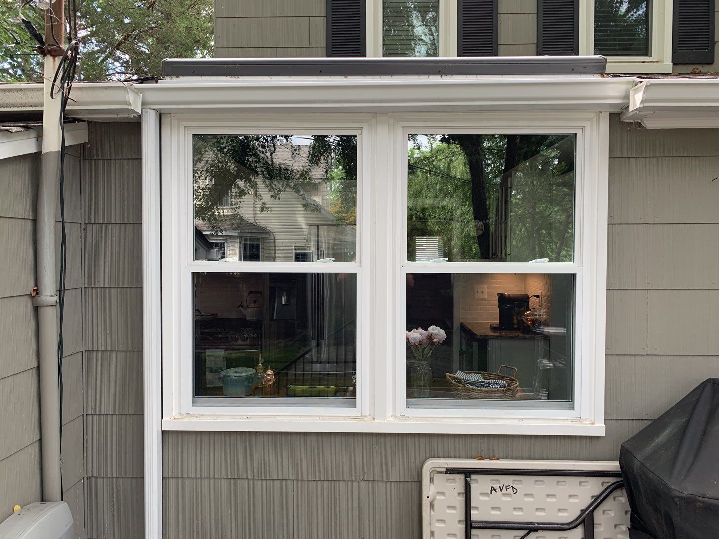 Skylight and Gutter Replacement by American Home Contractors