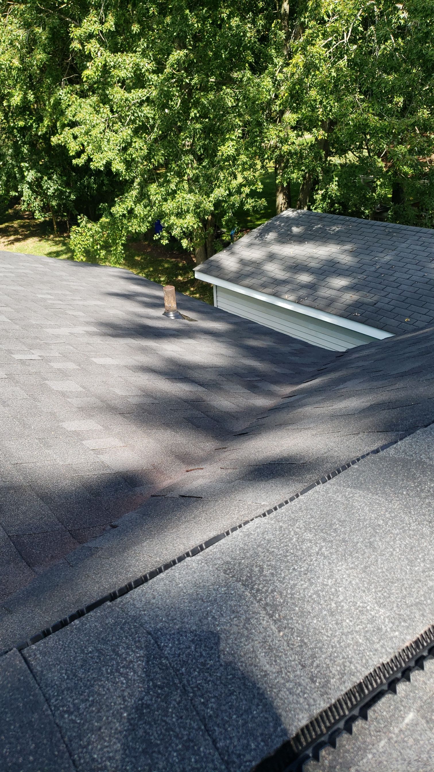 ATLAS PINNACLE COLOR: PRISTINE SCHOTCHGARD BLACK SHADOW DRIP EDGE: BLACK by Eagle Eye Roofing