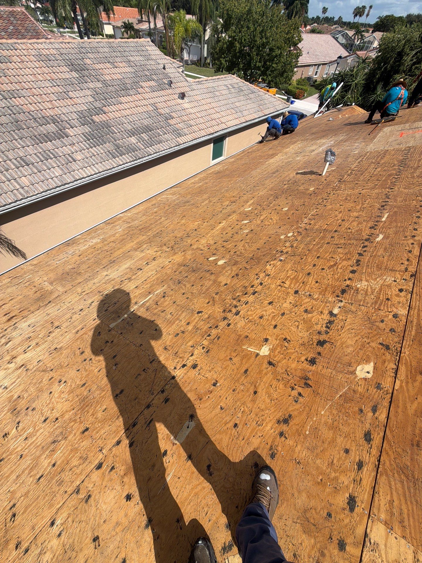 Tile Roof Replacement and Sheathing Repair in Boynton Beach by Aastro Roofing
