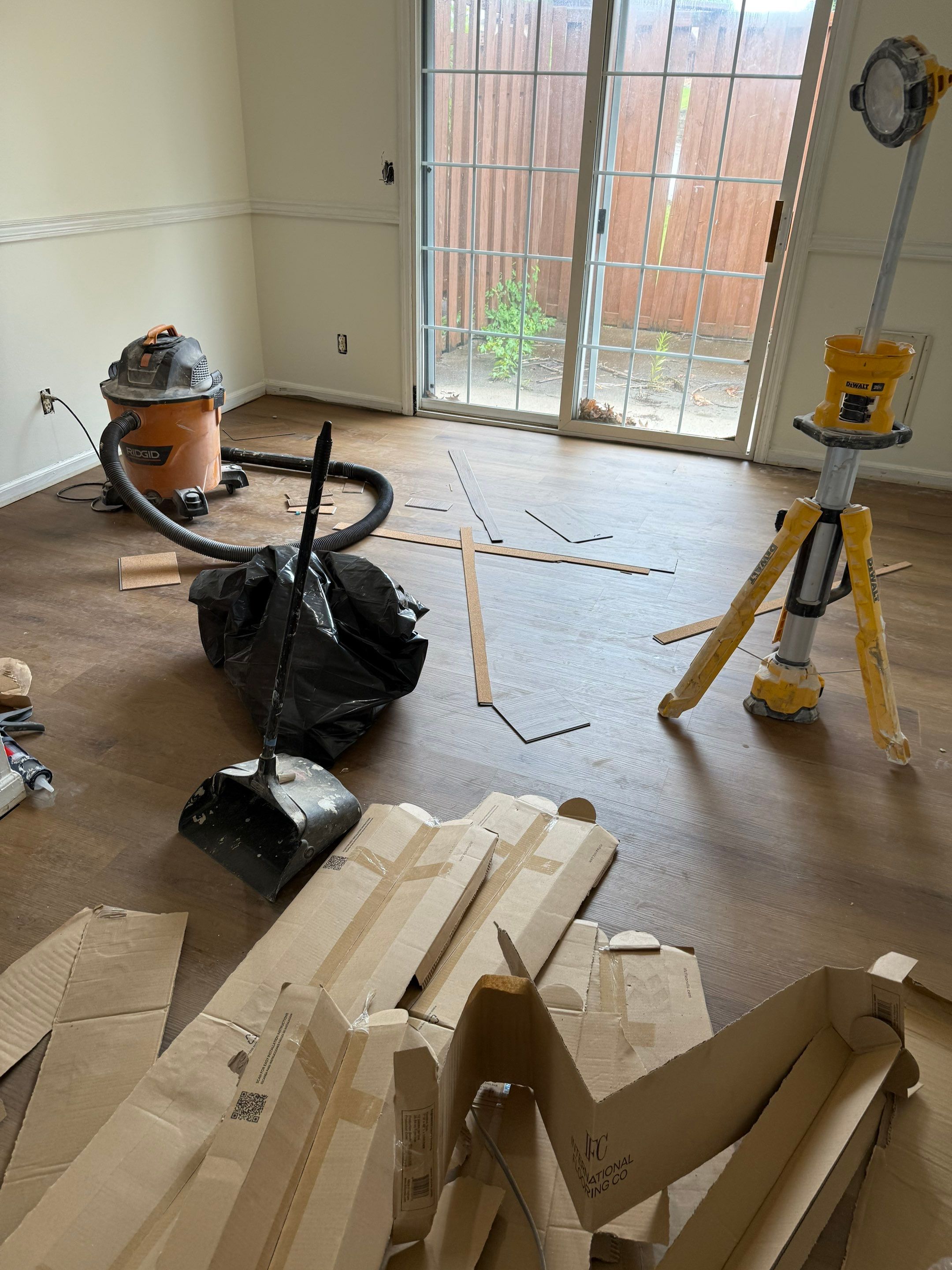 Complete Home Remodel Featuring Custom Kitchen and Wood-Look Plank Flooring by MAJO