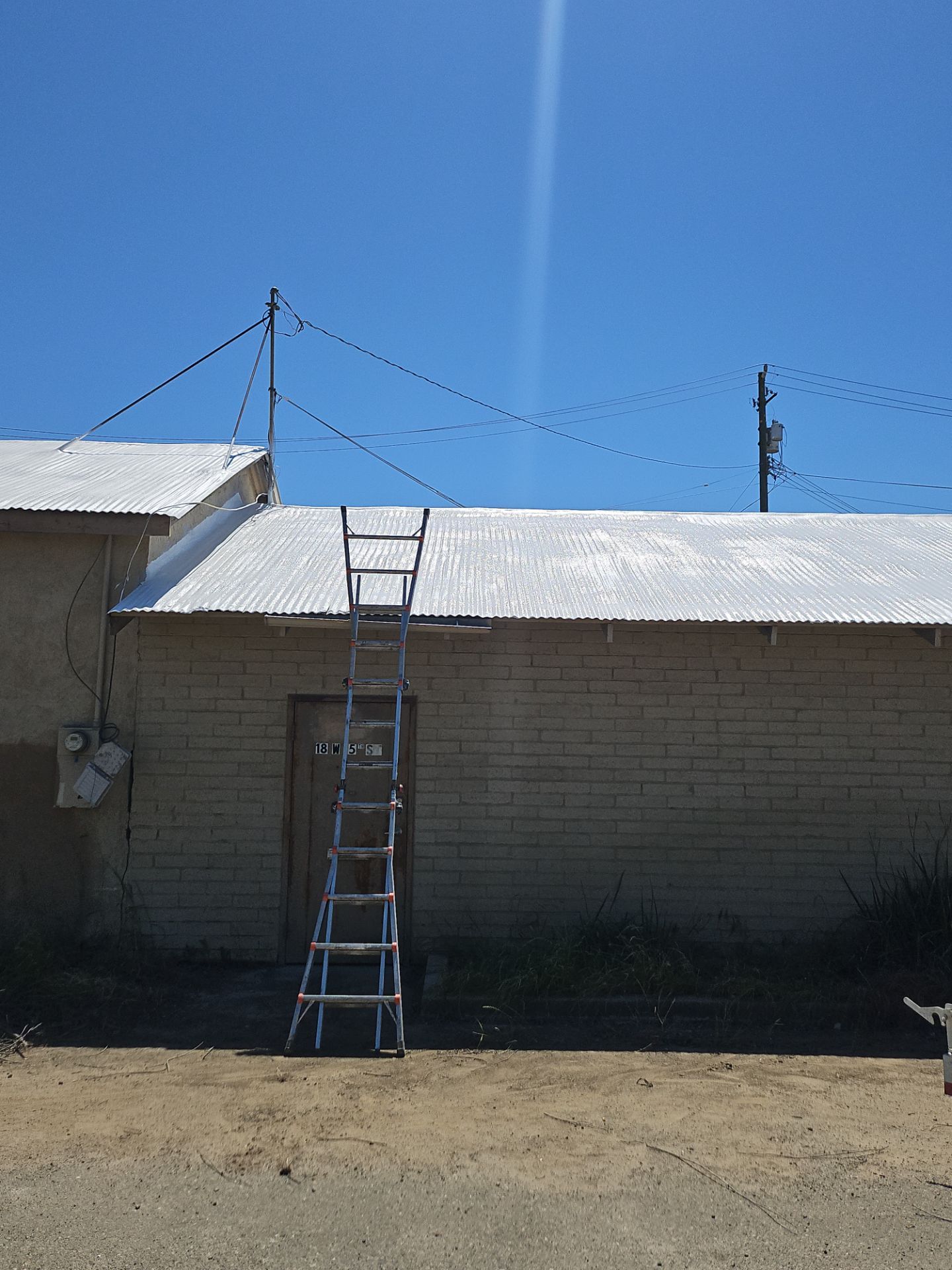 Spray foam and coatings using Conklin Benchmark/PUMA XL by Straight Edge Roofing Inc