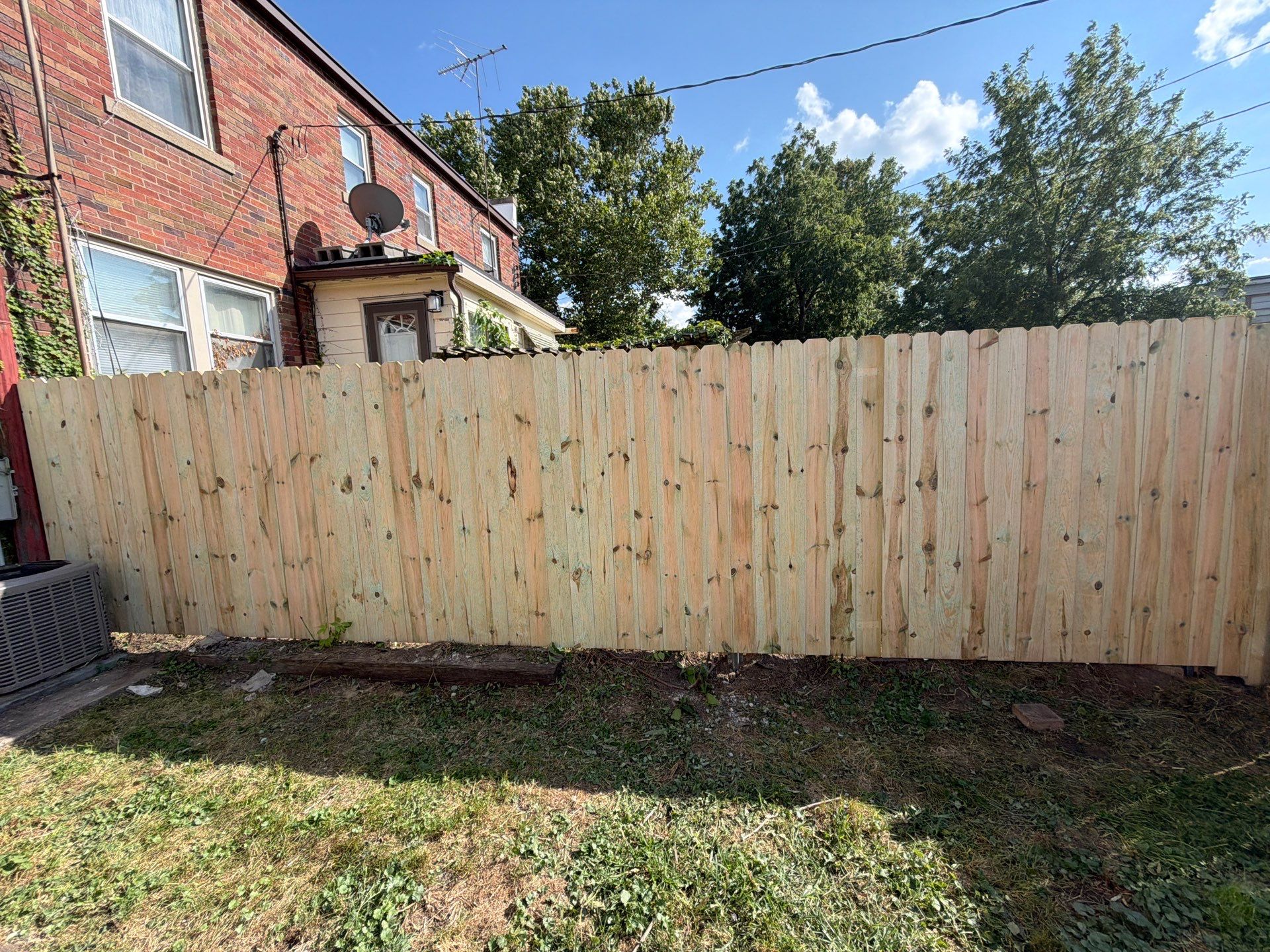 New Treated Wood Privacy Fence and Metal-Framed Gates by Perfect Picket Fence and Stain