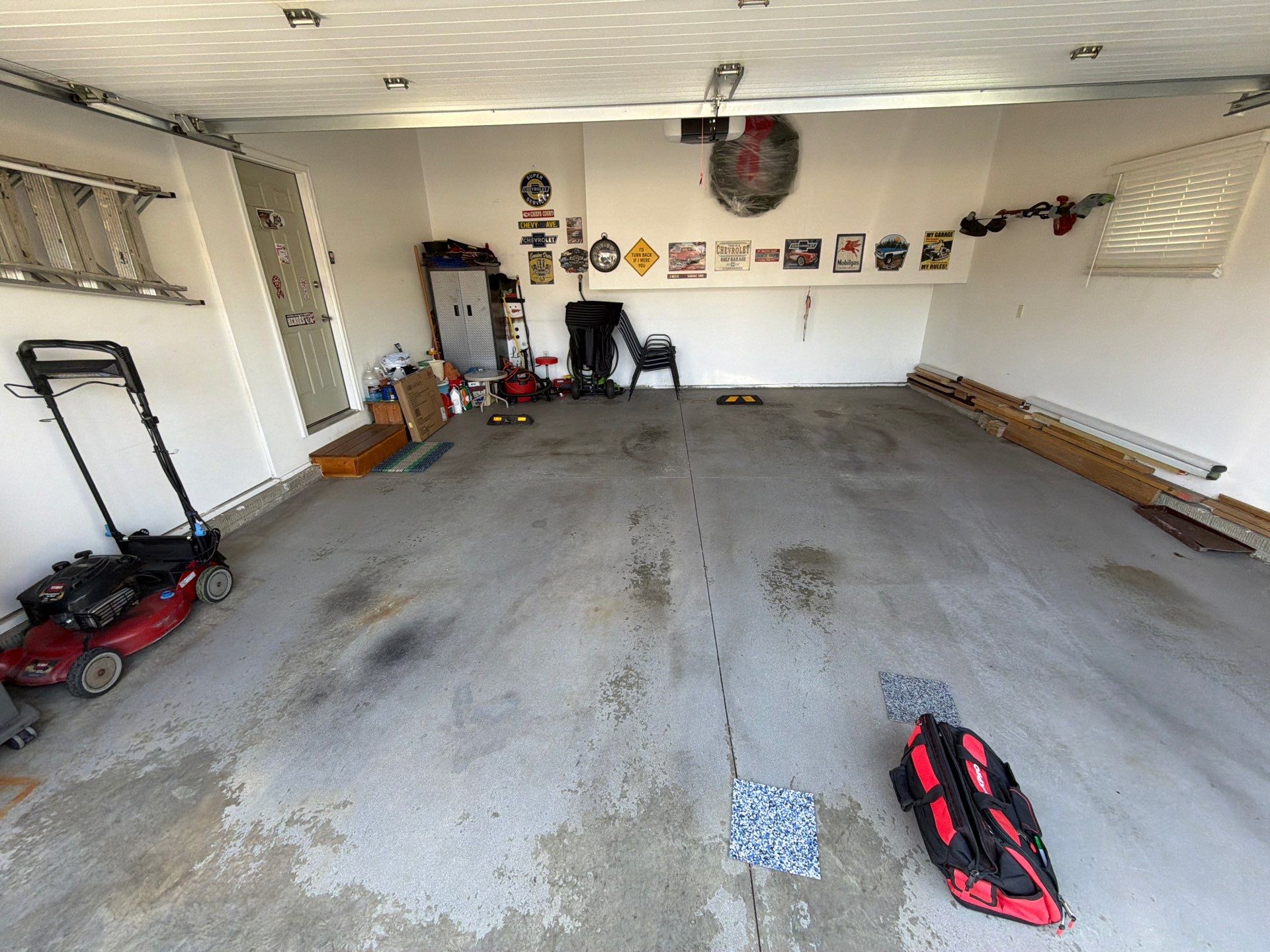 Sioux Falls Garage Floor Coating with Nightfall Decorative Chips by Select Painting, Coatings & Garage Cabinets