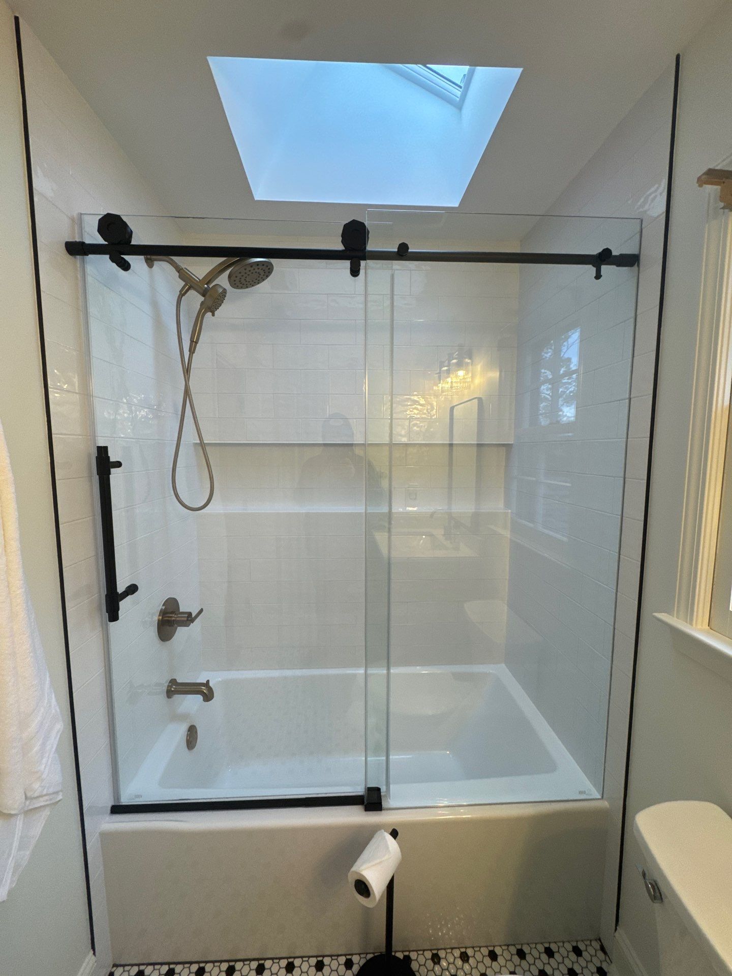 Smyrna Bathroom Remodel Featuring Sage Green Vanity and Hexagonal Tile by Swift Home Renovations