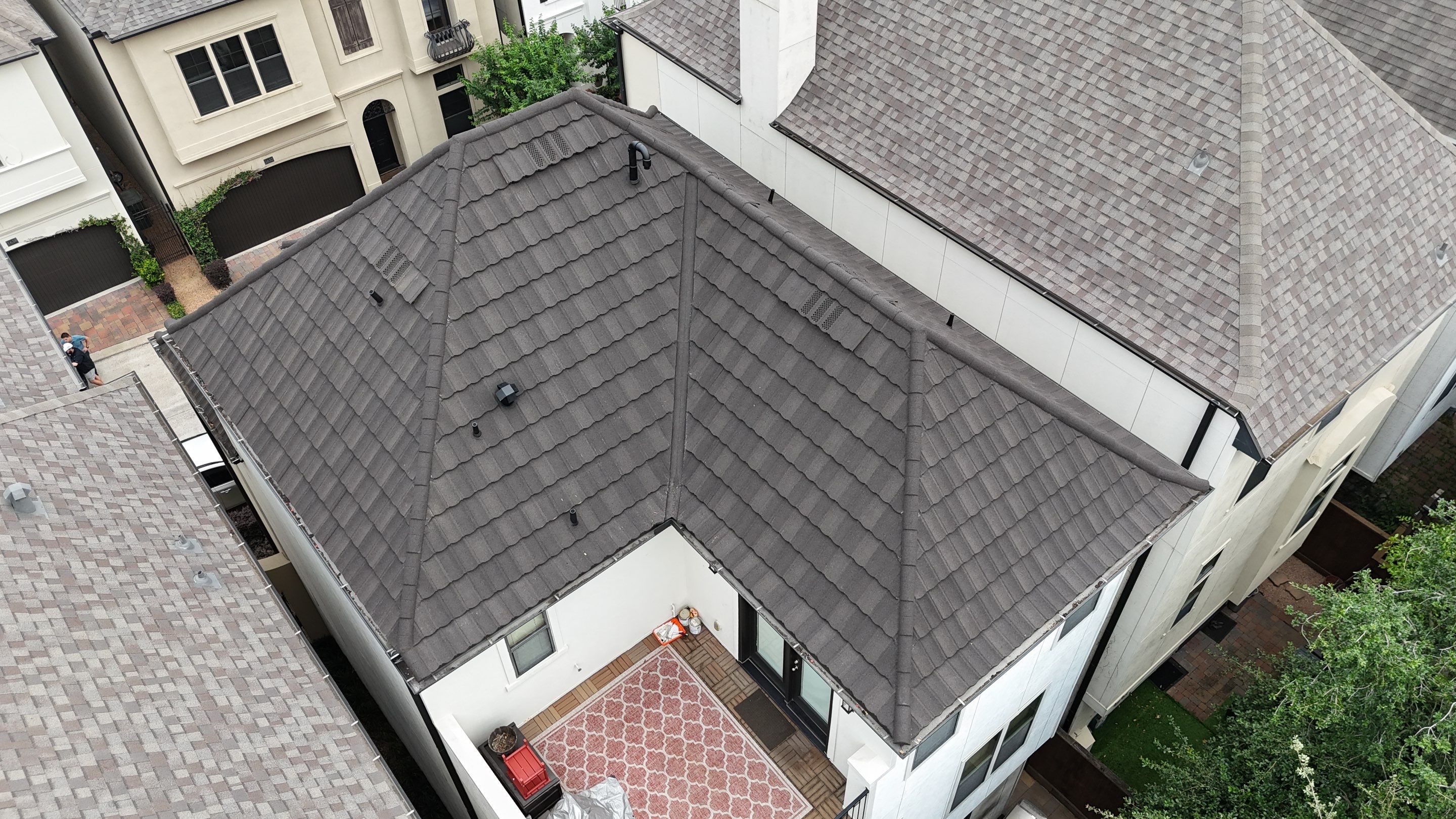 Stunning transformation from Shingles to DECRA Tile by Core Four Roofing