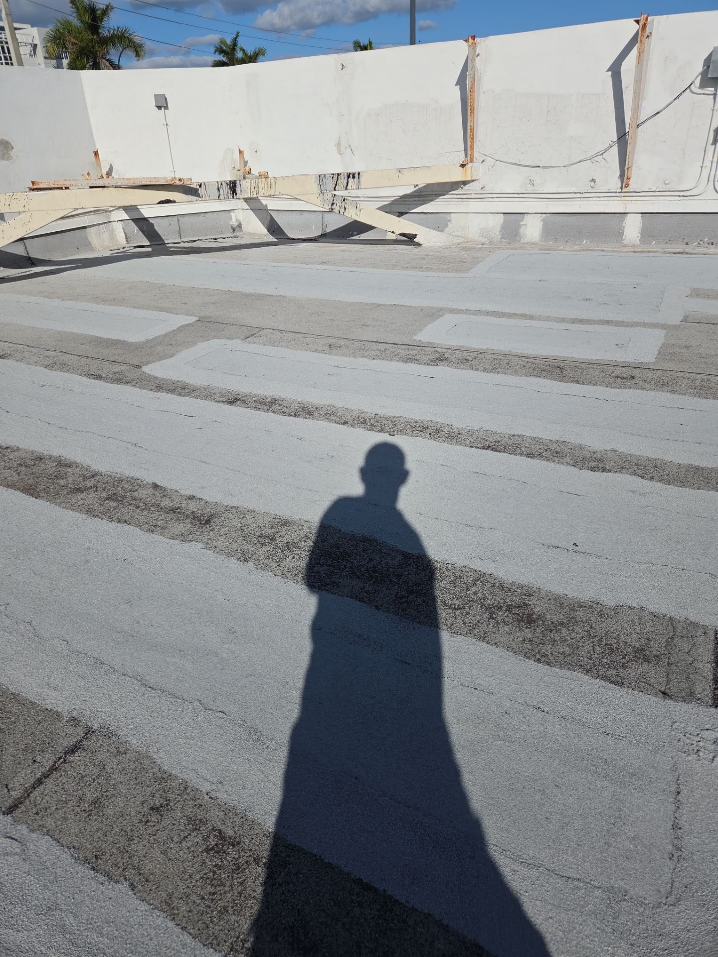 Commercial Flat Roof Restoration Using Silicone Coating in Hallandale Beach by Aastro Roofing