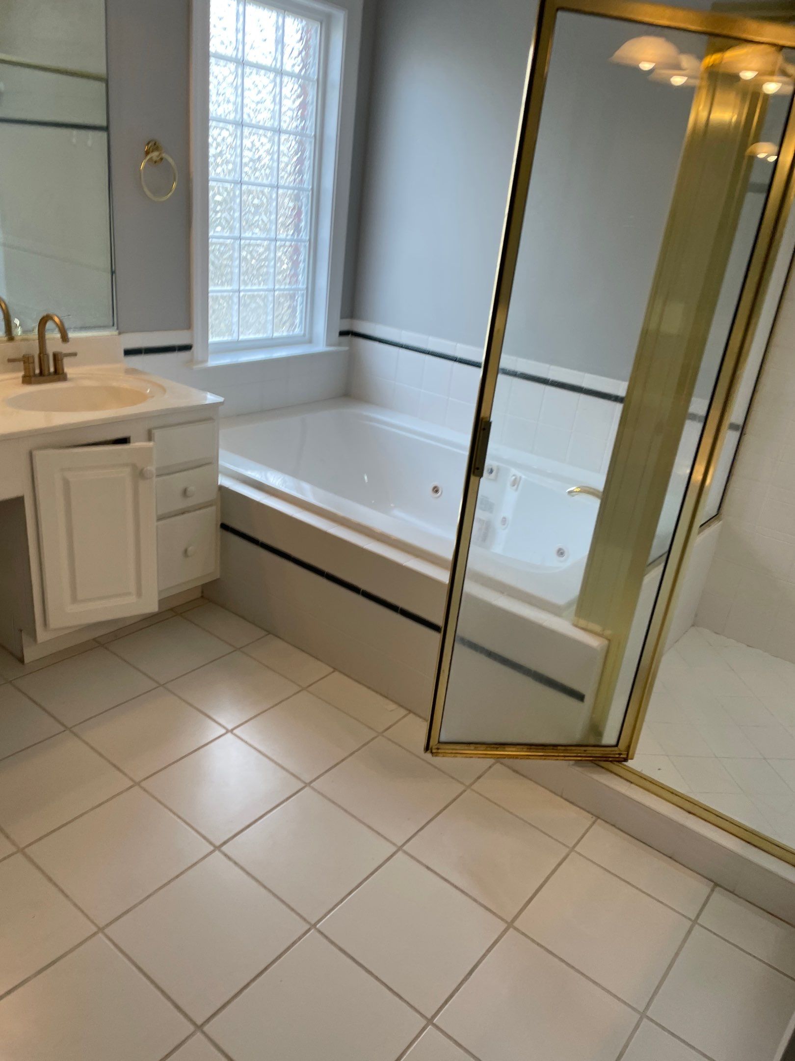 Bathroom Remodel using Schluter by Footprints Floors of Coastal Carolina